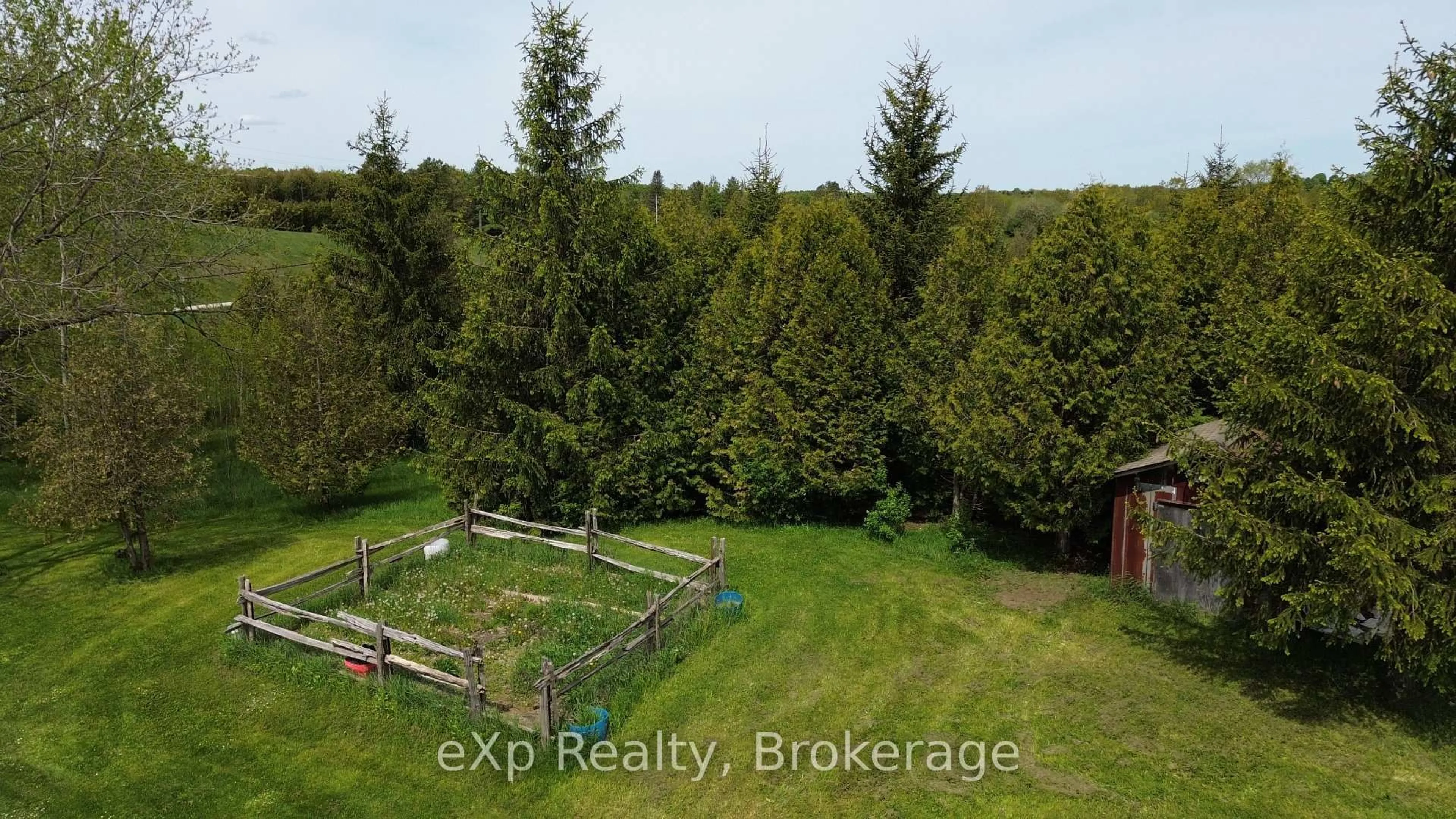 A pic from outside/outdoor area/front of a property/back of a property/a pic from drone, forest/trees view for 775355 10 Highway, Grey Highlands Ontario N0C 1H0