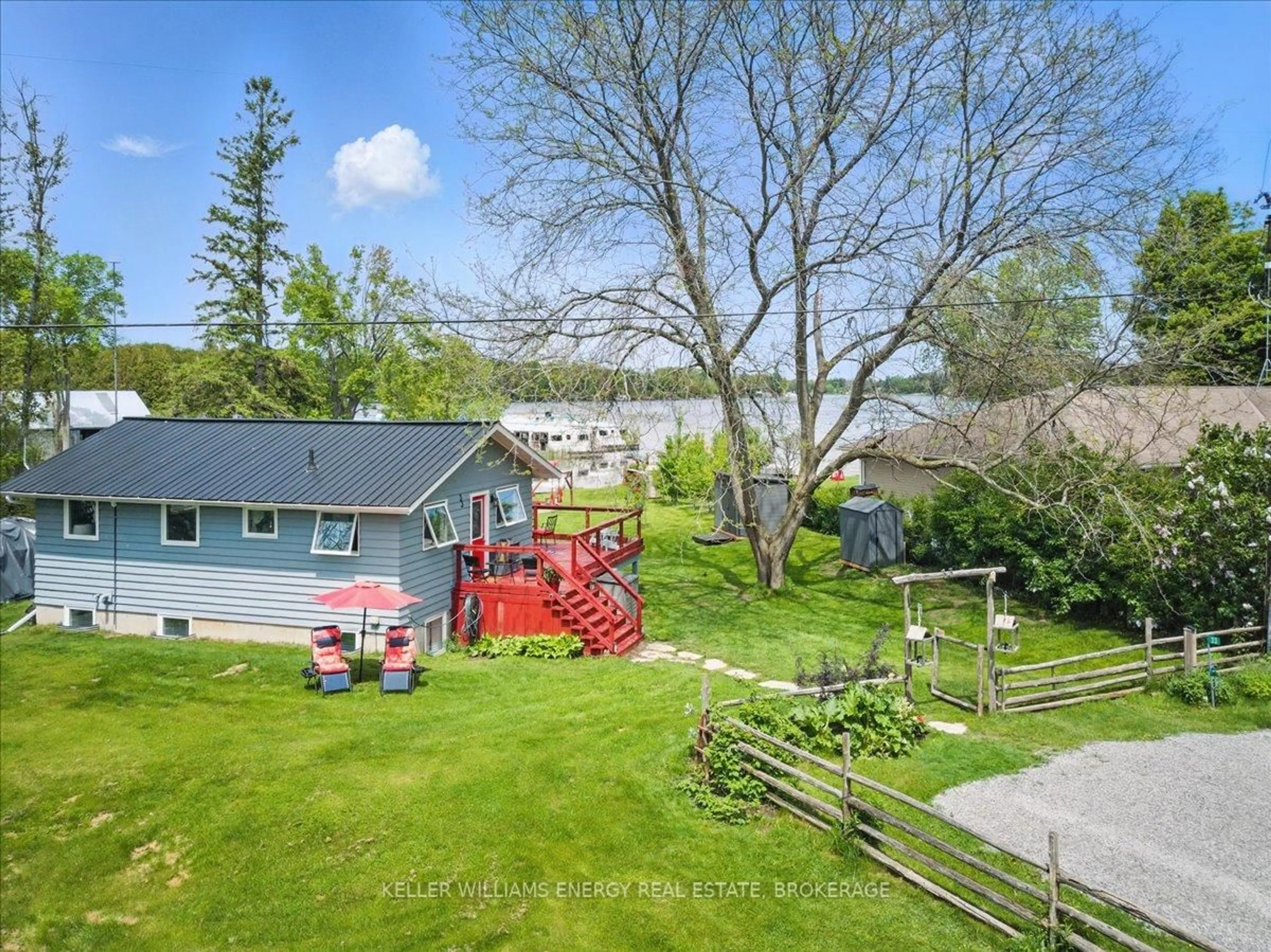 A pic from outside/outdoor area/front of a property/back of a property/a pic from drone, water/lake/river/ocean view for 33 Lila Crt, Kawartha Lakes Ontario K0L 2W0
