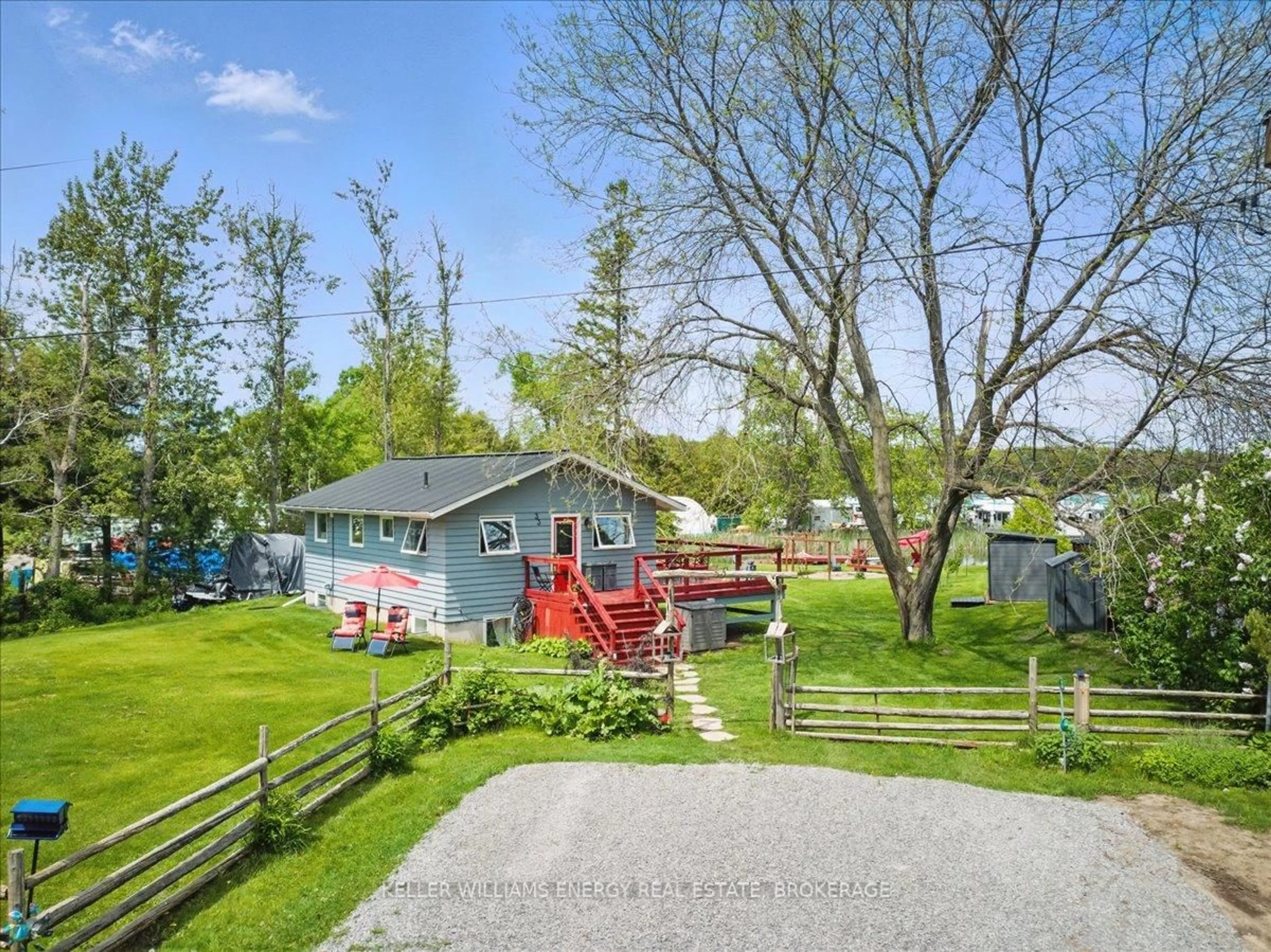 A pic from outside/outdoor area/front of a property/back of a property/a pic from drone, water/lake/river/ocean view for 33 Lila Crt, Kawartha Lakes Ontario K0L 2W0