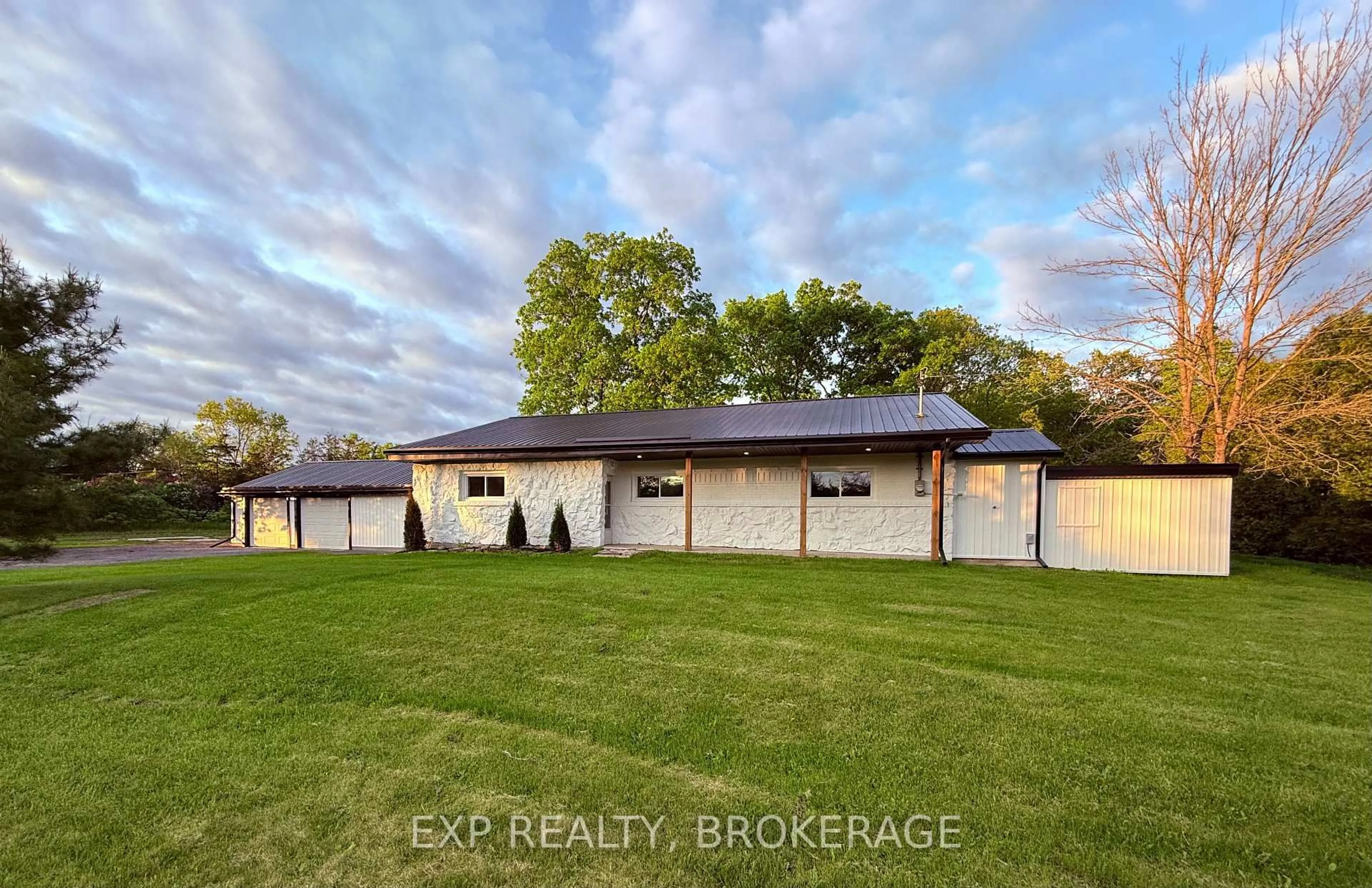 A pic from outside/outdoor area/front of a property/back of a property/a pic from drone, unknown for 675 MILLHAVEN Rd, Bissett Creek Ontario K0H 2H0