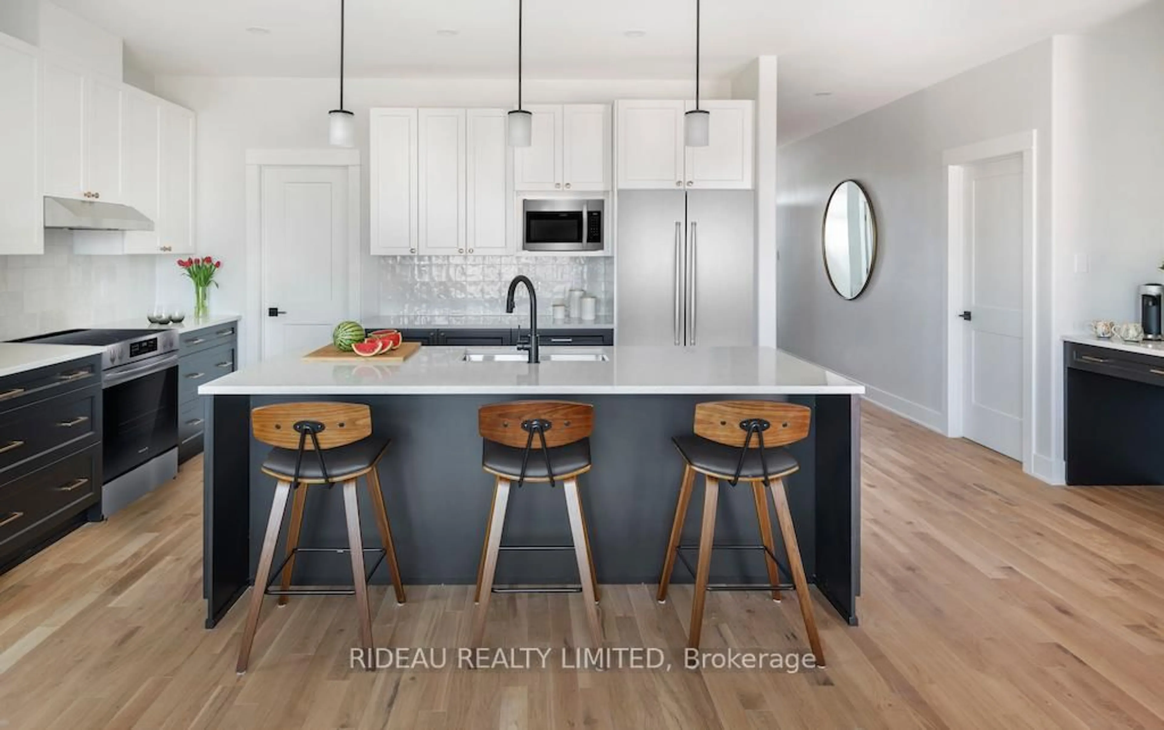 Open concept kitchen, wood/laminate floor for 110 Hearthside Dr, Westport Ontario K0G 1X0