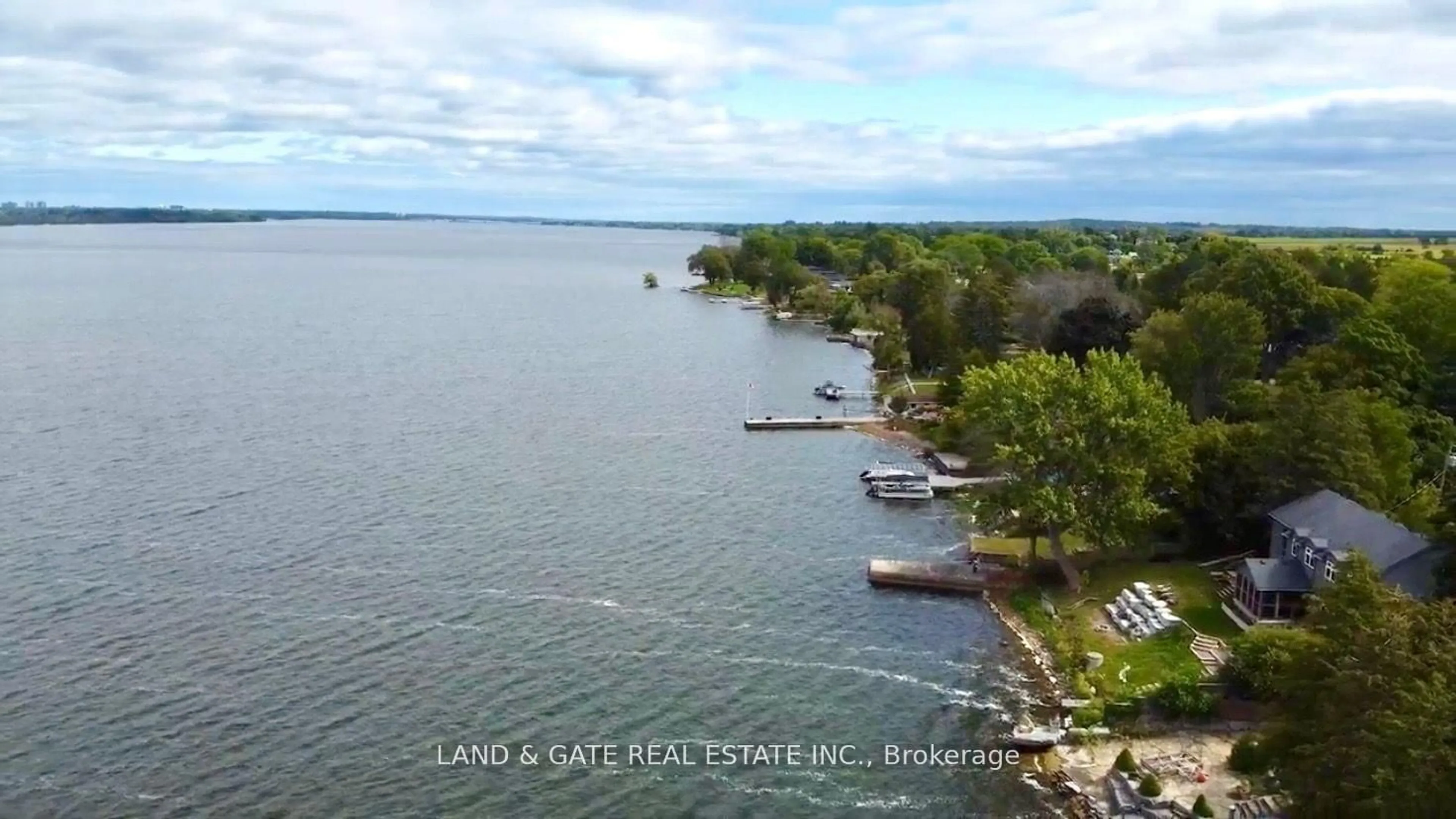 A pic from outside/outdoor area/front of a property/back of a property/a pic from drone, water/lake/river/ocean view for 14 Eastern Ave, Prince Edward County Ontario K8N 4Z1
