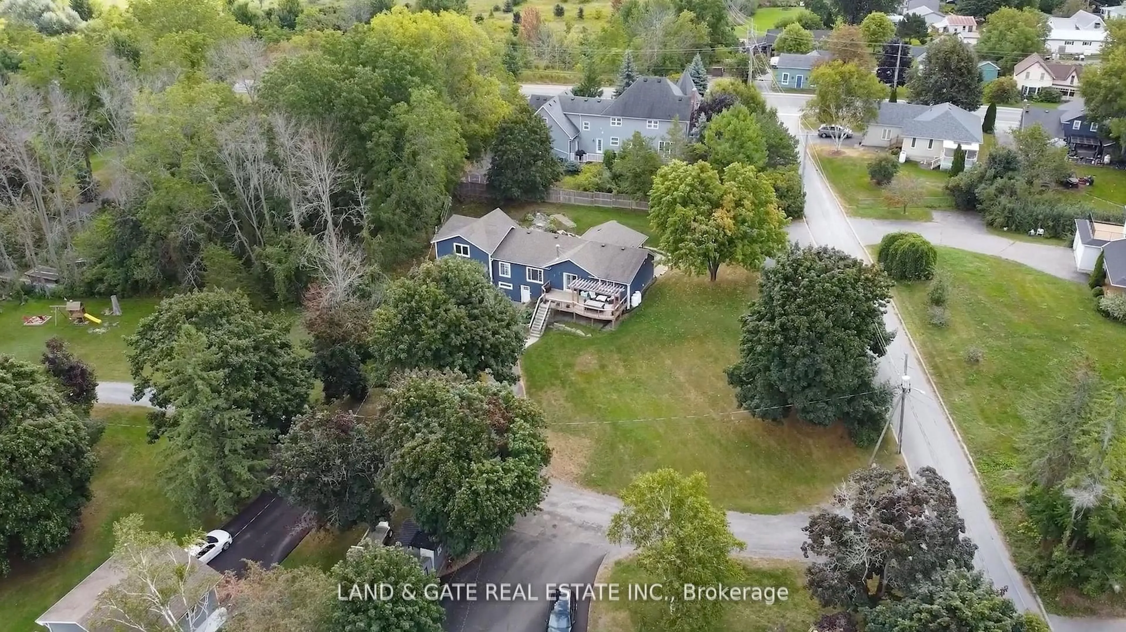 A pic from outside/outdoor area/front of a property/back of a property/a pic from drone, water/lake/river/ocean view for 14 Eastern Ave, Prince Edward County Ontario K8N 4Z1