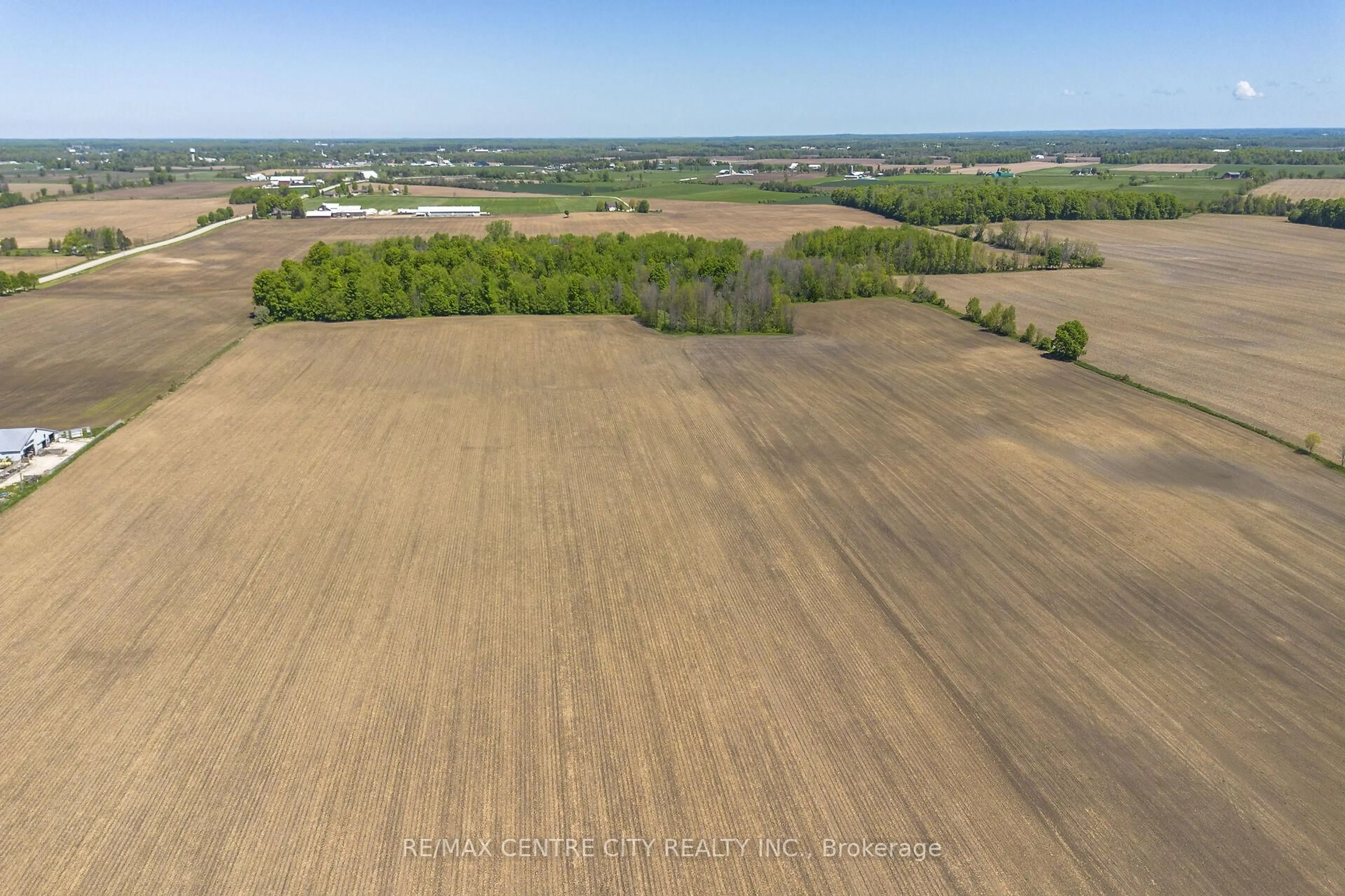 A pic from outside/outdoor area/front of a property/back of a property/a pic from drone, forest/trees view for 6124 5th Line, Minto Ontario N0G 2P0
