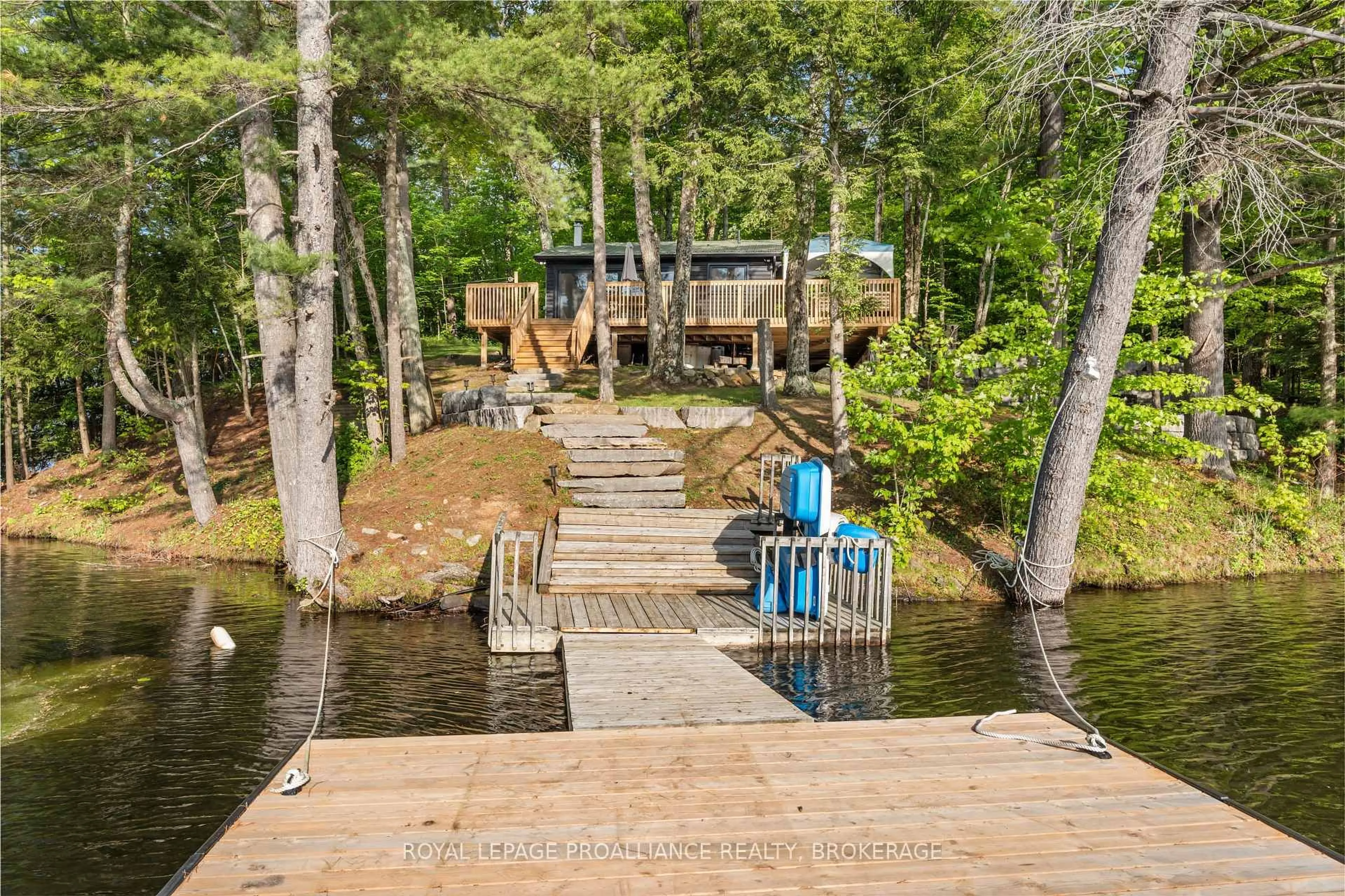 A pic from outside/outdoor area/front of a property/back of a property/a pic from drone, water/lake/river/ocean view for 55 Oak Shores Cres, Tichborne Ontario K0H 2V0