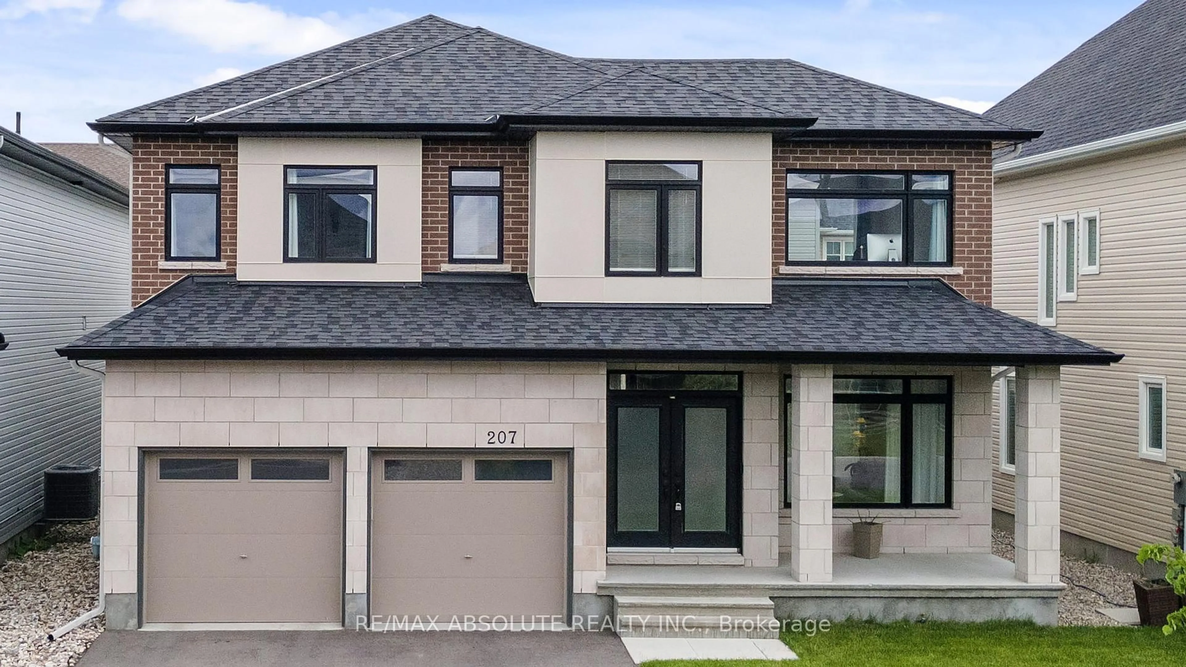 Home with brick exterior material, street for 207 Osterley Way, Ottawa Ontario K2S 2N6