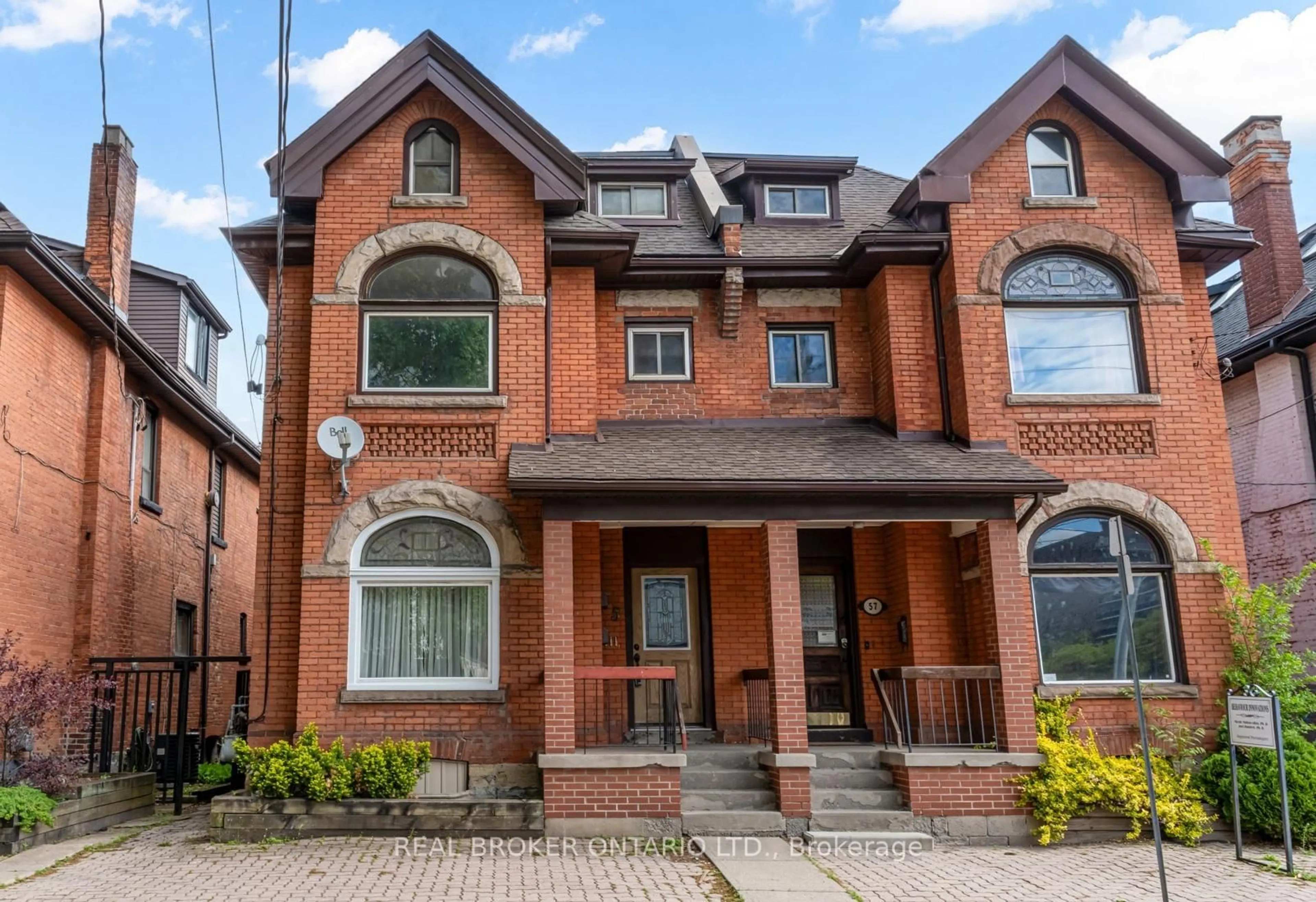 Home with brick exterior material, street for 55 Young St, Hamilton Ontario L8N 1V1