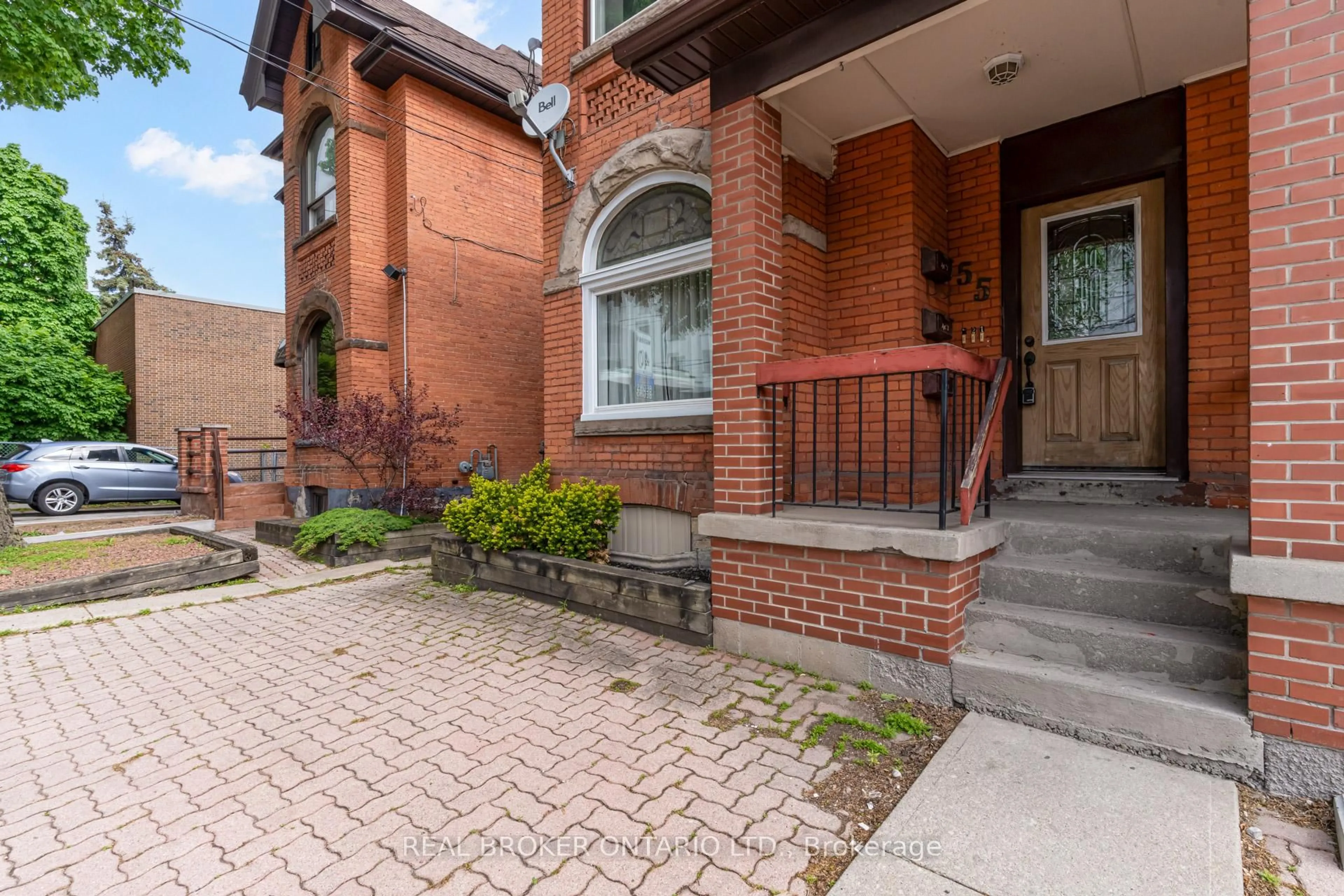 Home with brick exterior material, street for 55 Young St, Hamilton Ontario L8N 1V1