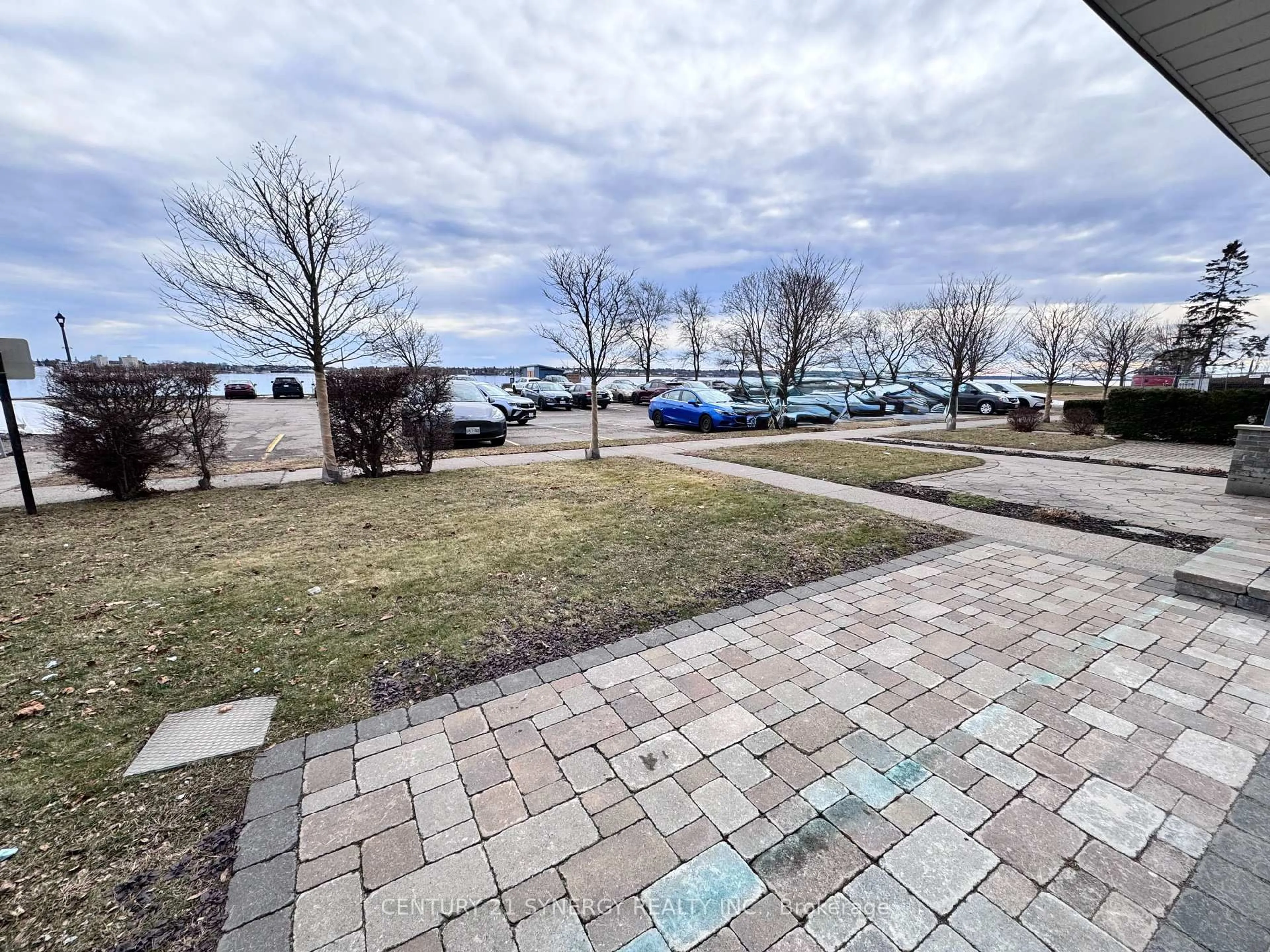 A pic from outside/outdoor area/front of a property/back of a property/a pic from drone, water/lake/river/ocean view for 235 Water St #119, Prescott Ontario K0E 1T0