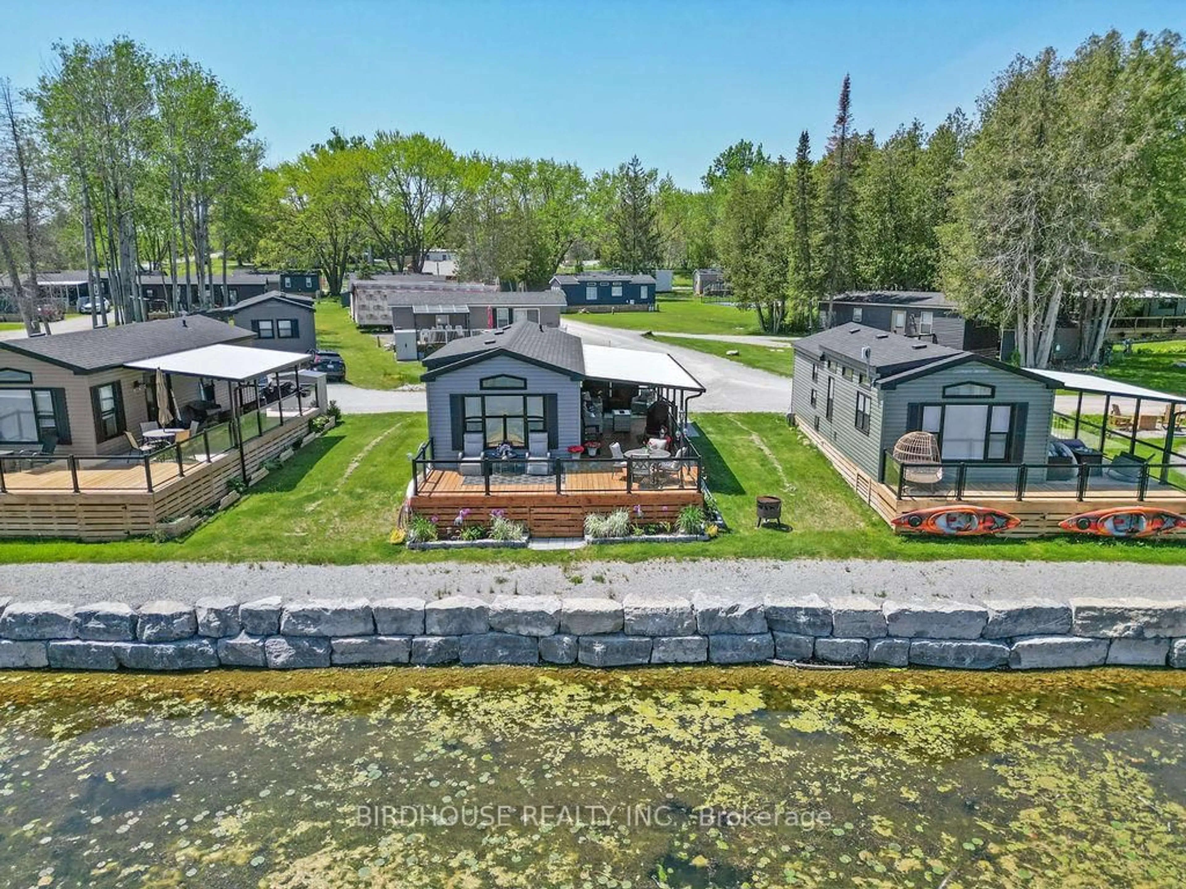 A pic from outside/outdoor area/front of a property/back of a property/a pic from drone, water/lake/river/ocean view for 657 Thunder Bridge Rd #W4, Kawartha Lakes Ontario K9V 4R1