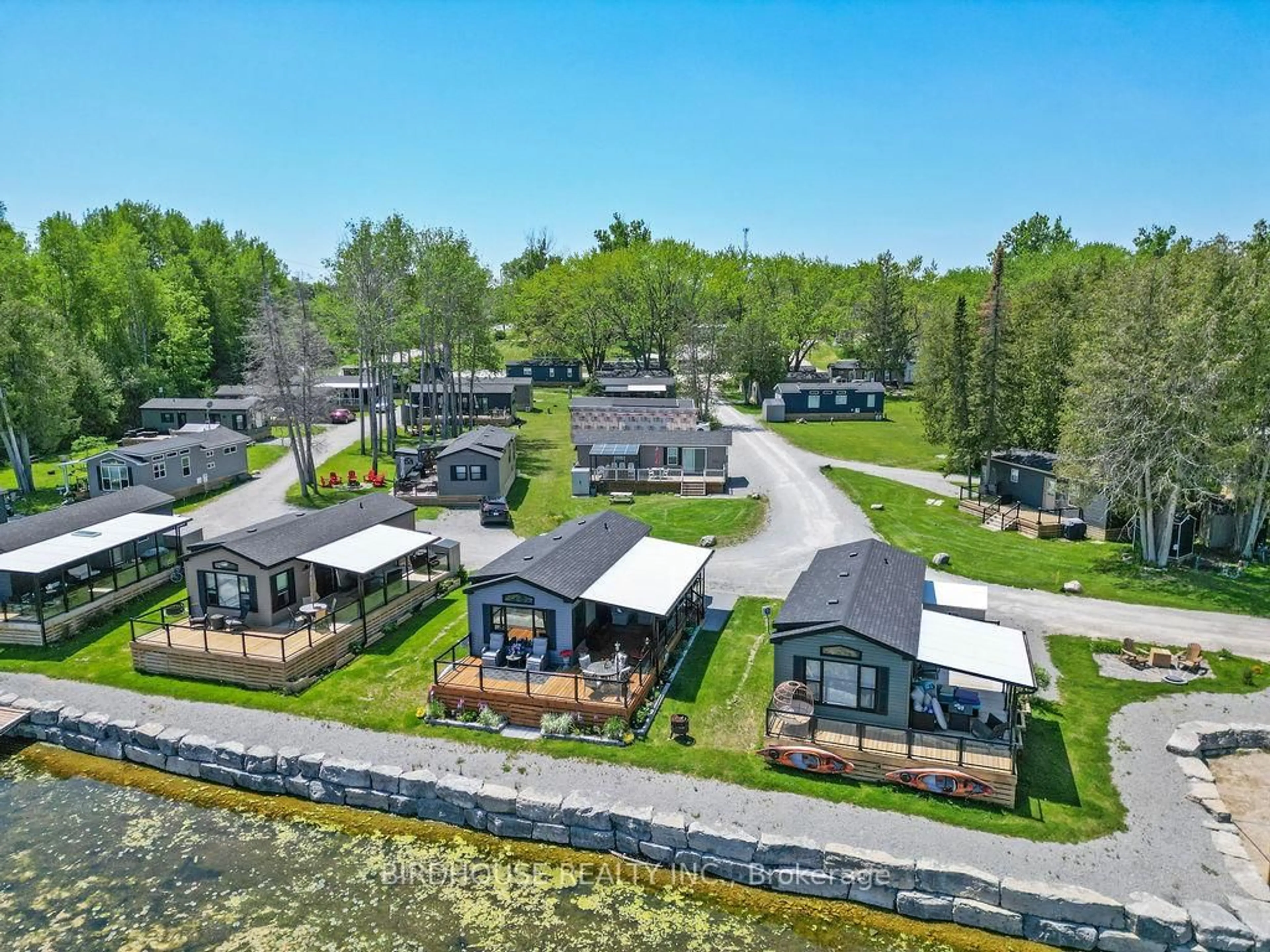 A pic from outside/outdoor area/front of a property/back of a property/a pic from drone, water/lake/river/ocean view for 657 Thunder Bridge Rd #W4, Kawartha Lakes Ontario K9V 4R1