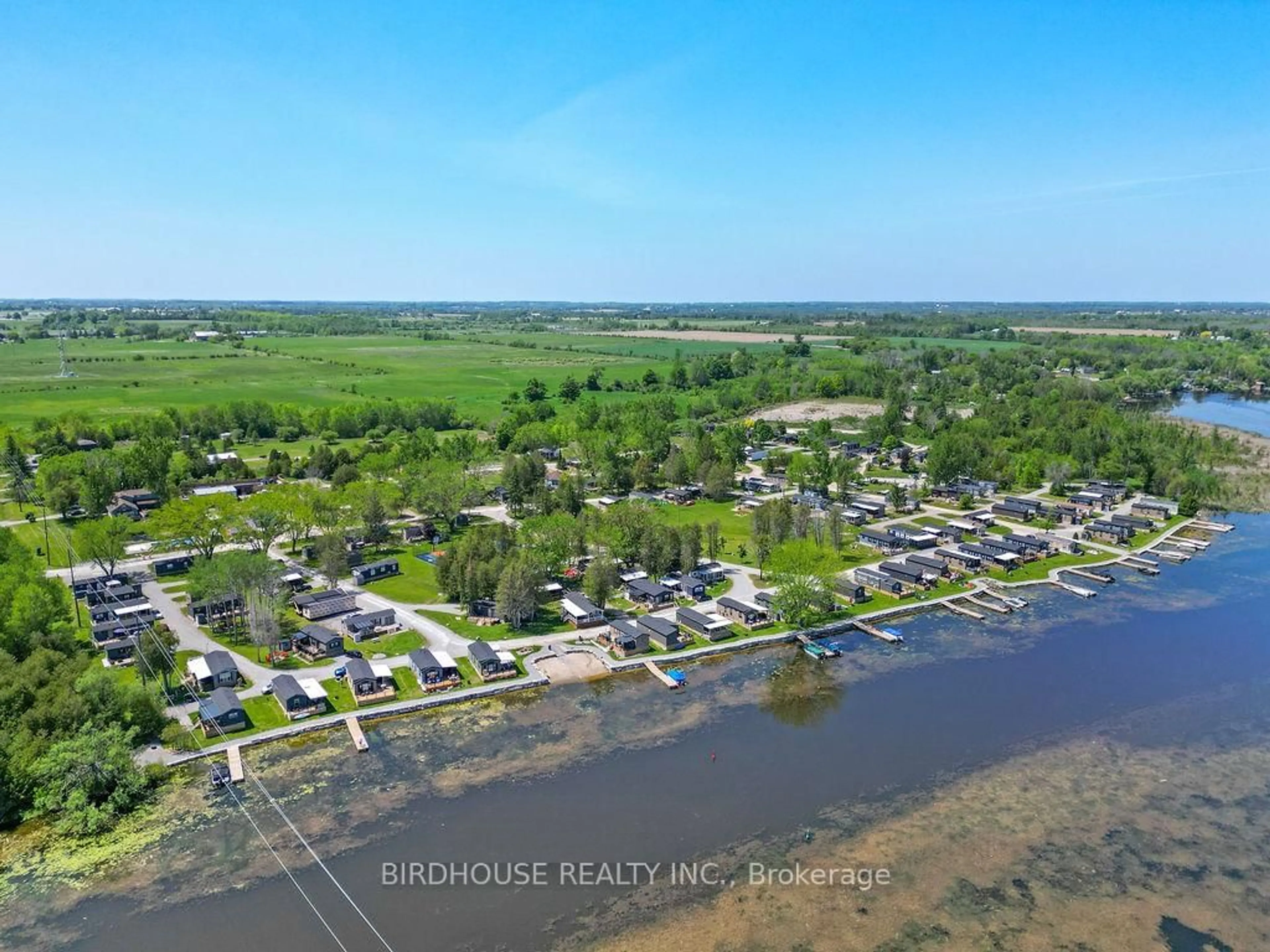 A pic from outside/outdoor area/front of a property/back of a property/a pic from drone, water/lake/river/ocean view for 657 Thunder Bridge Rd #W4, Kawartha Lakes Ontario K9V 4R1