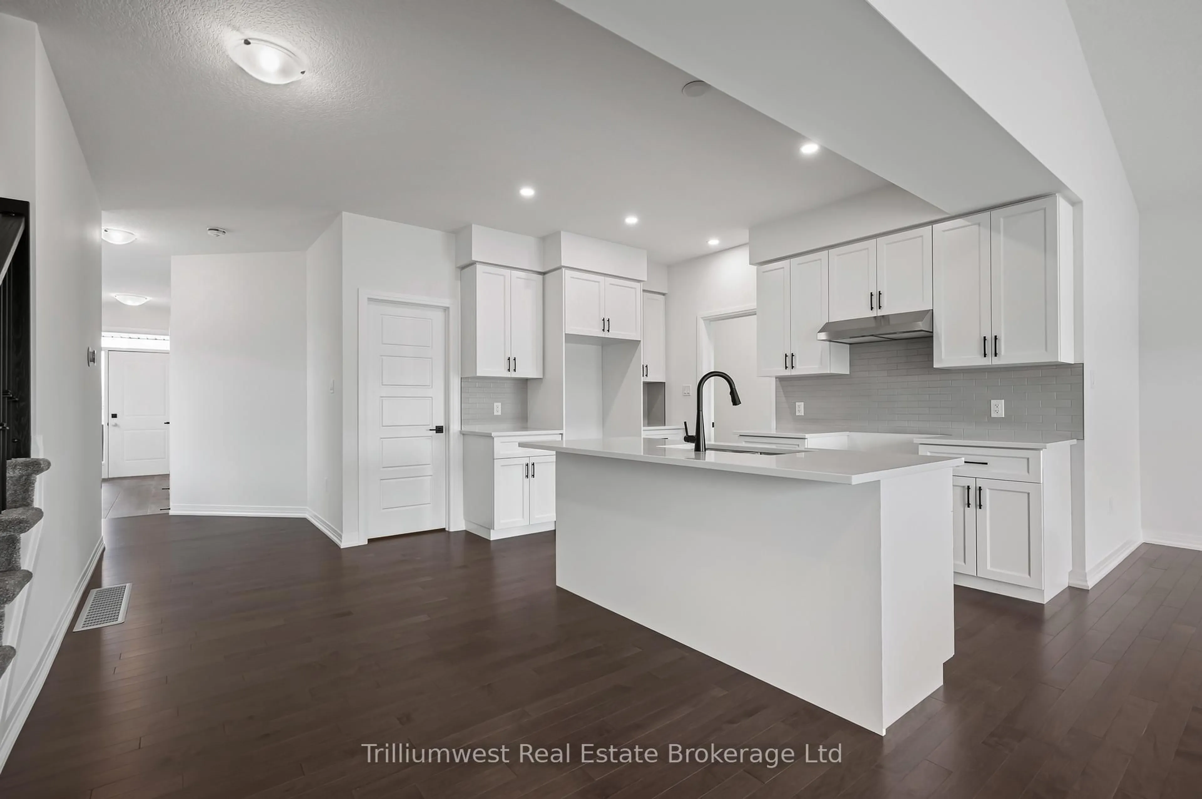 Open concept kitchen, wood/laminate floor for 130 Imrie Rd, Centre Wellington Ontario N0B 2S0
