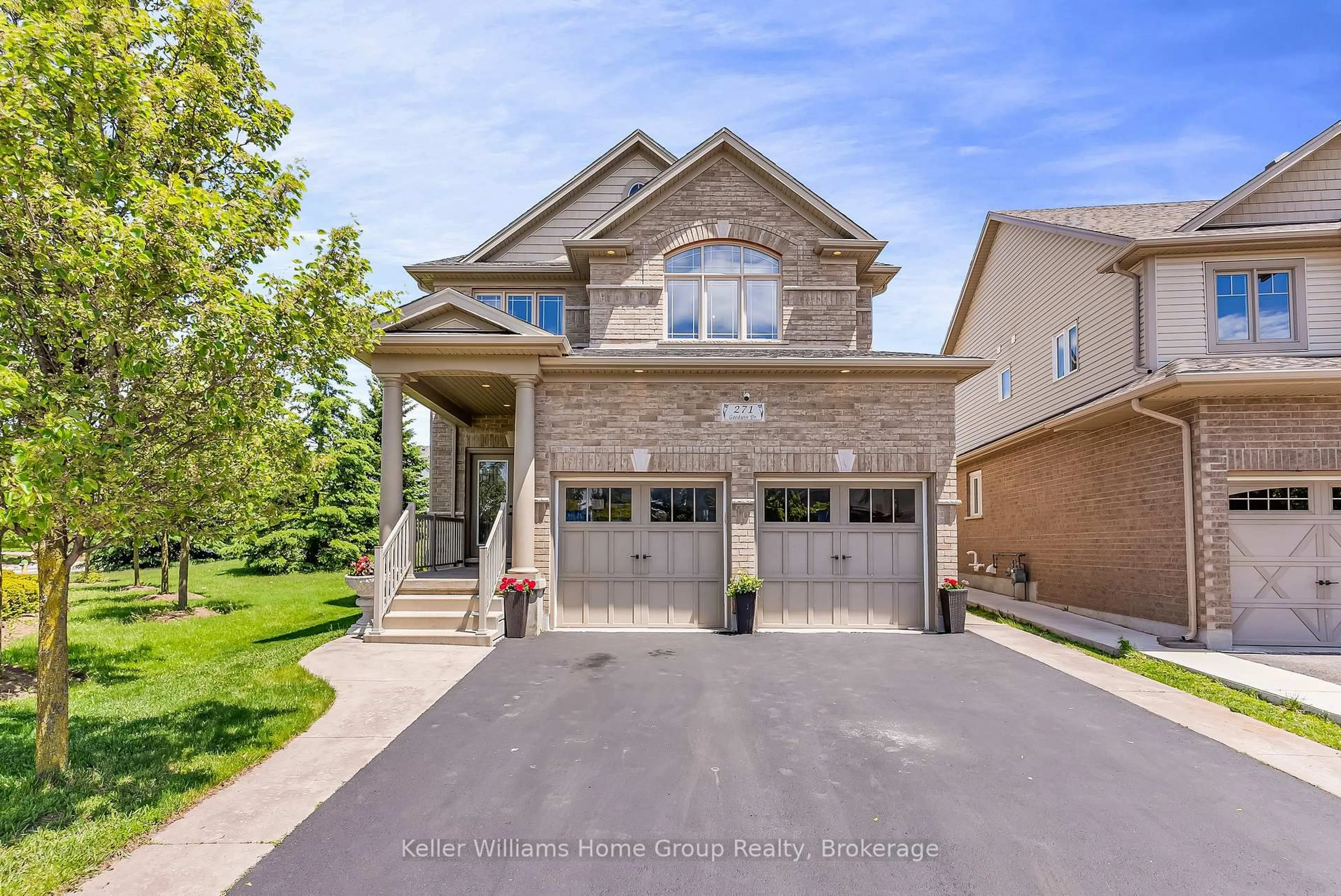 Home with brick exterior material, street for 271 Goodwin Dr, Guelph Ontario N1L 1C3