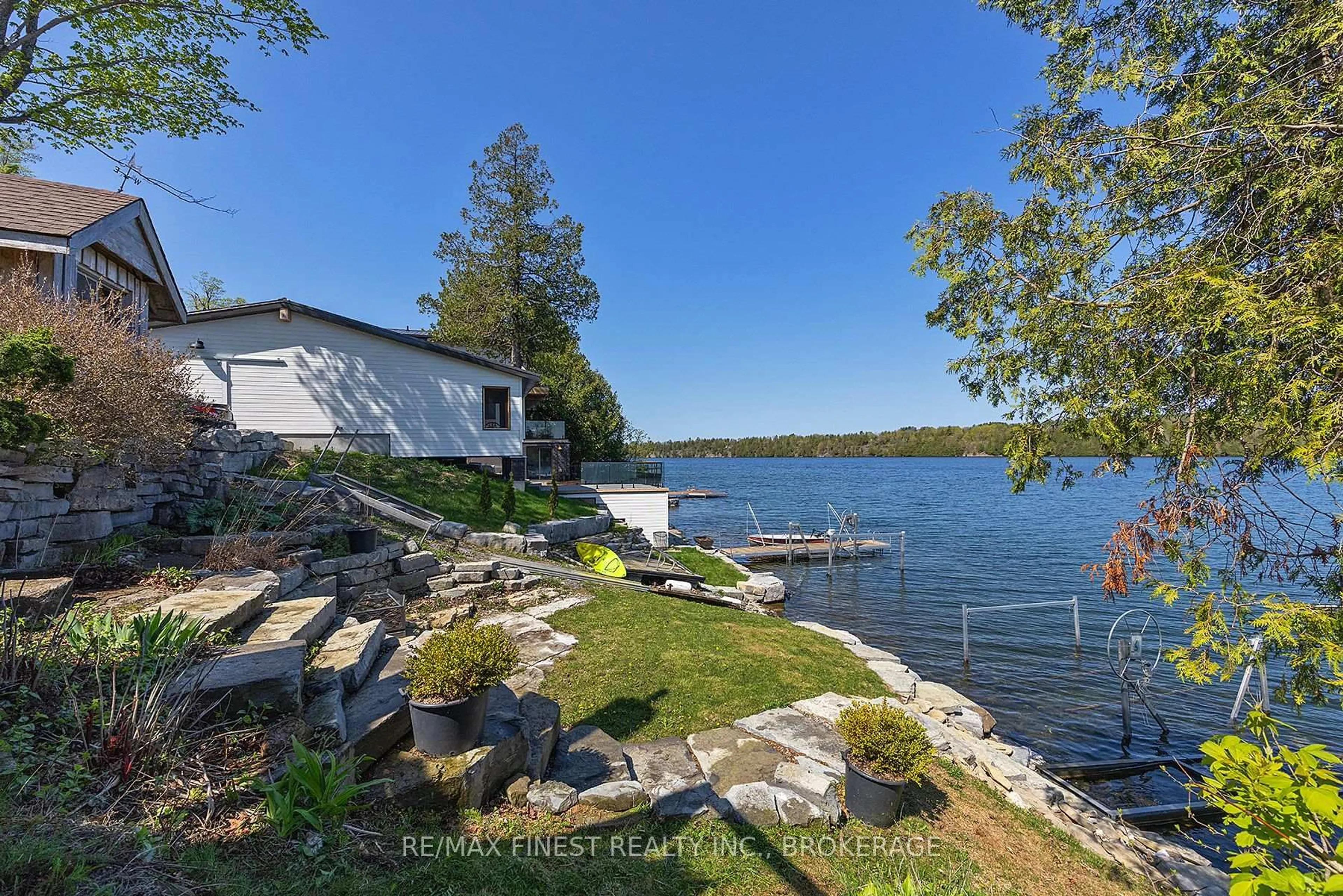 A pic from outside/outdoor area/front of a property/back of a property/a pic from drone, water/lake/river/ocean view for 1048 Lark Lane, Inverary Ontario K0H 1X0