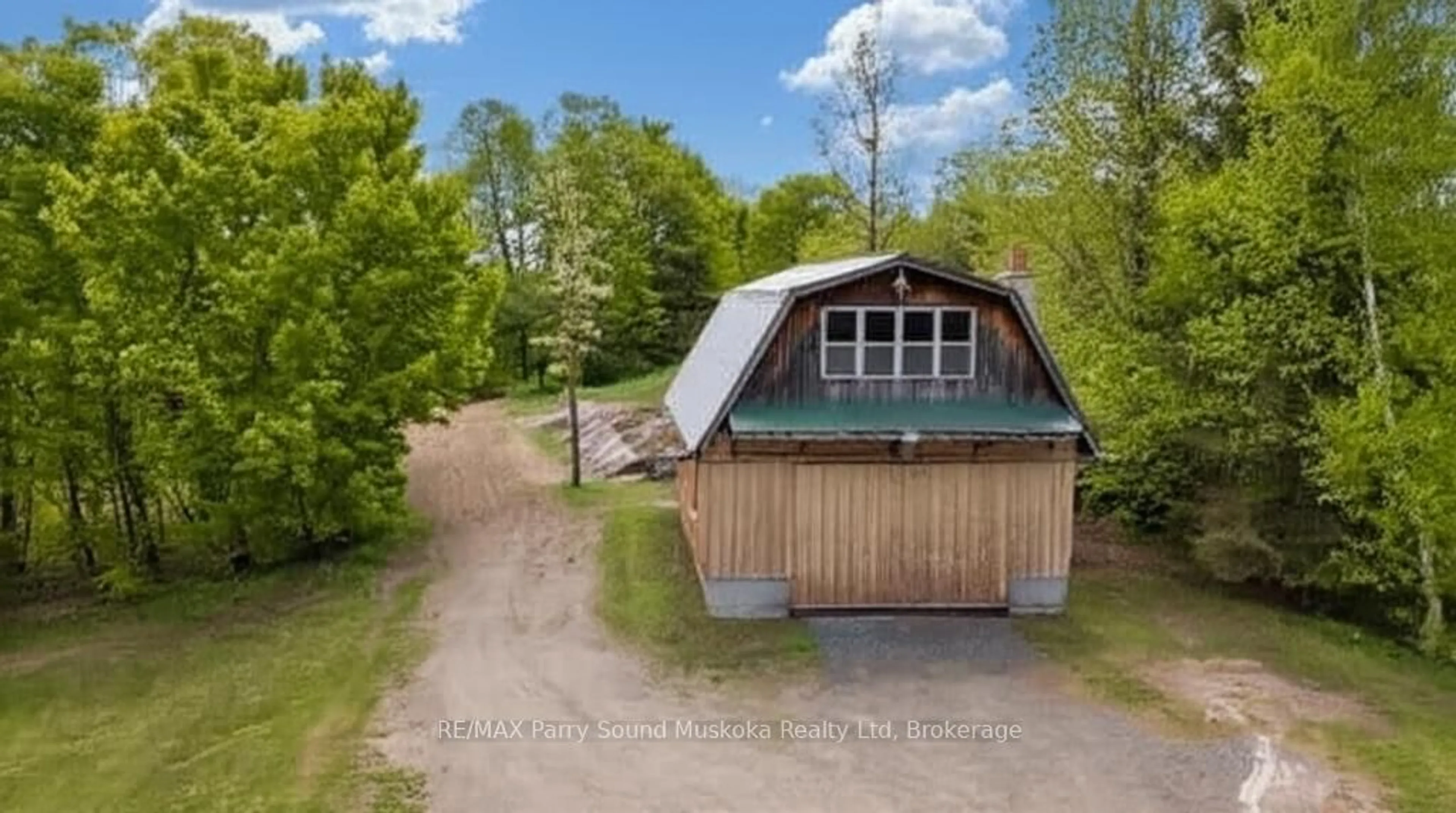 A pic from outside/outdoor area/front of a property/back of a property/a pic from drone, unknown for 3 Fire Route 100 Rd, McKellar Ontario P0G 1C0
