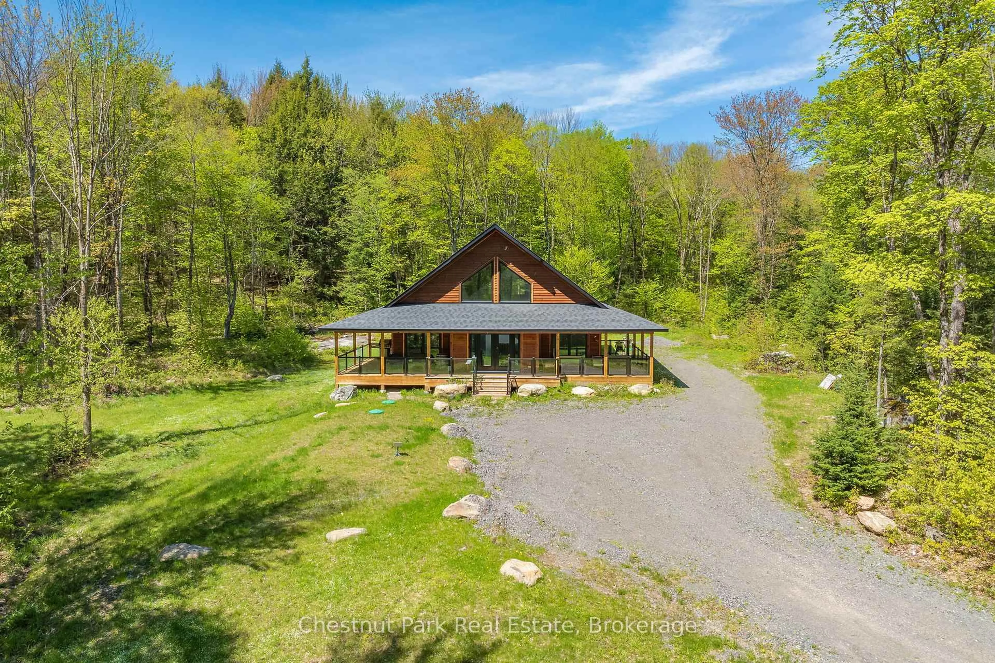 A pic from outside/outdoor area/front of a property/back of a property/a pic from drone, mountain view for 1299 Hekkla Rd, Muskoka Lakes Ontario P0C 1J0