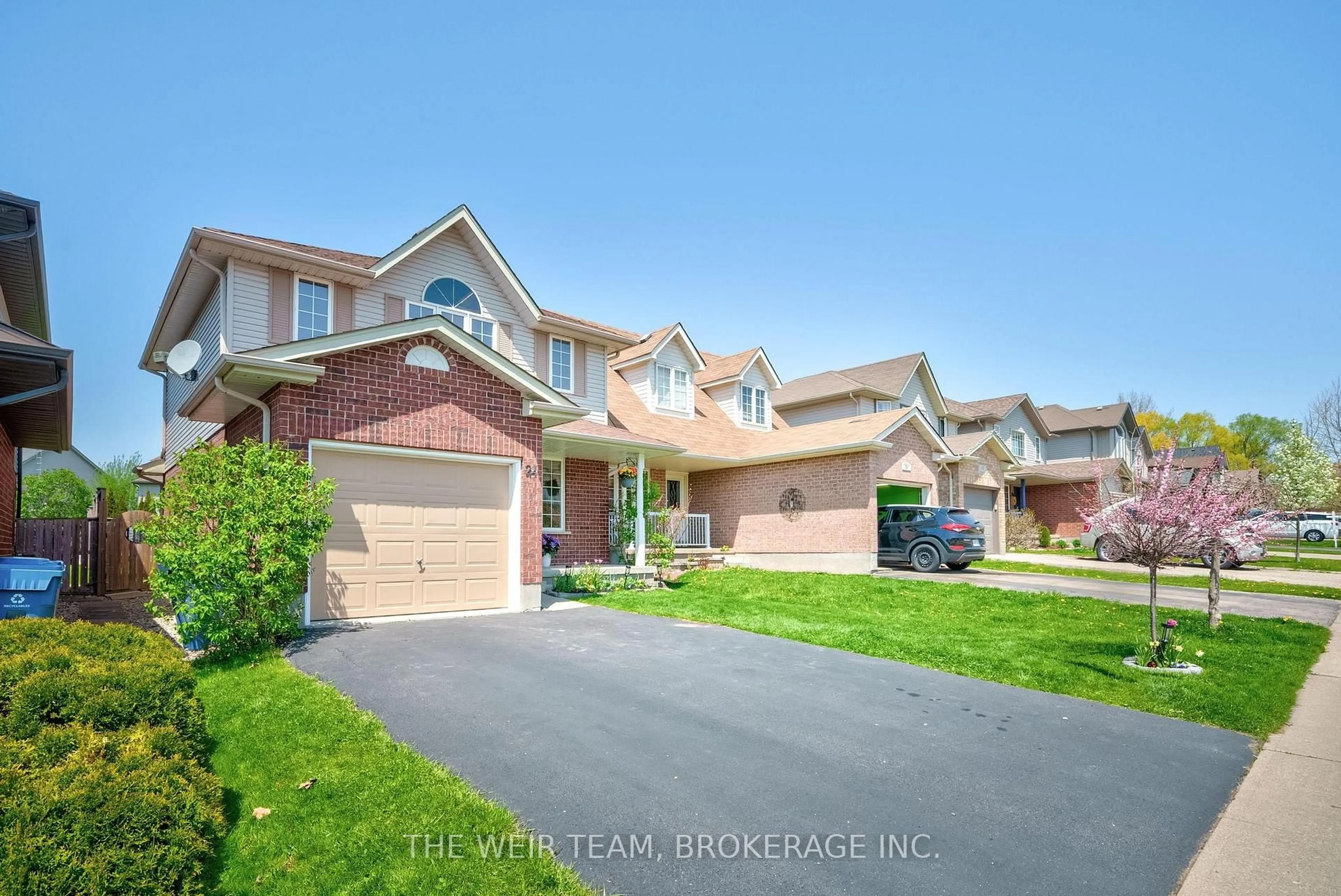 Home with brick exterior material, street for 24 Maude Lane, Guelph Ontario N1E 0G3