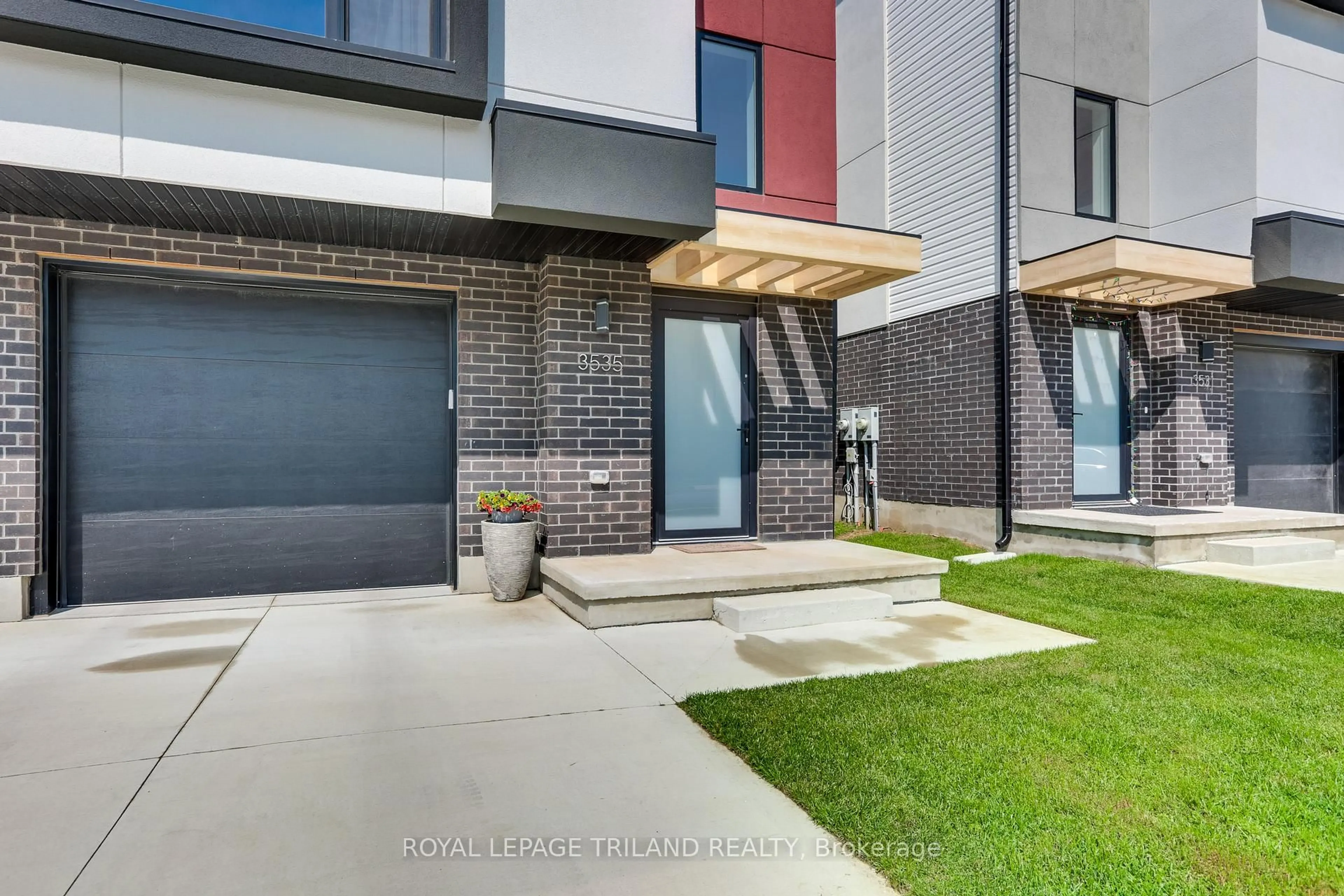 Home with brick exterior material, street for 3535 Emily Carr Lane, London South Ontario N6L 0H7
