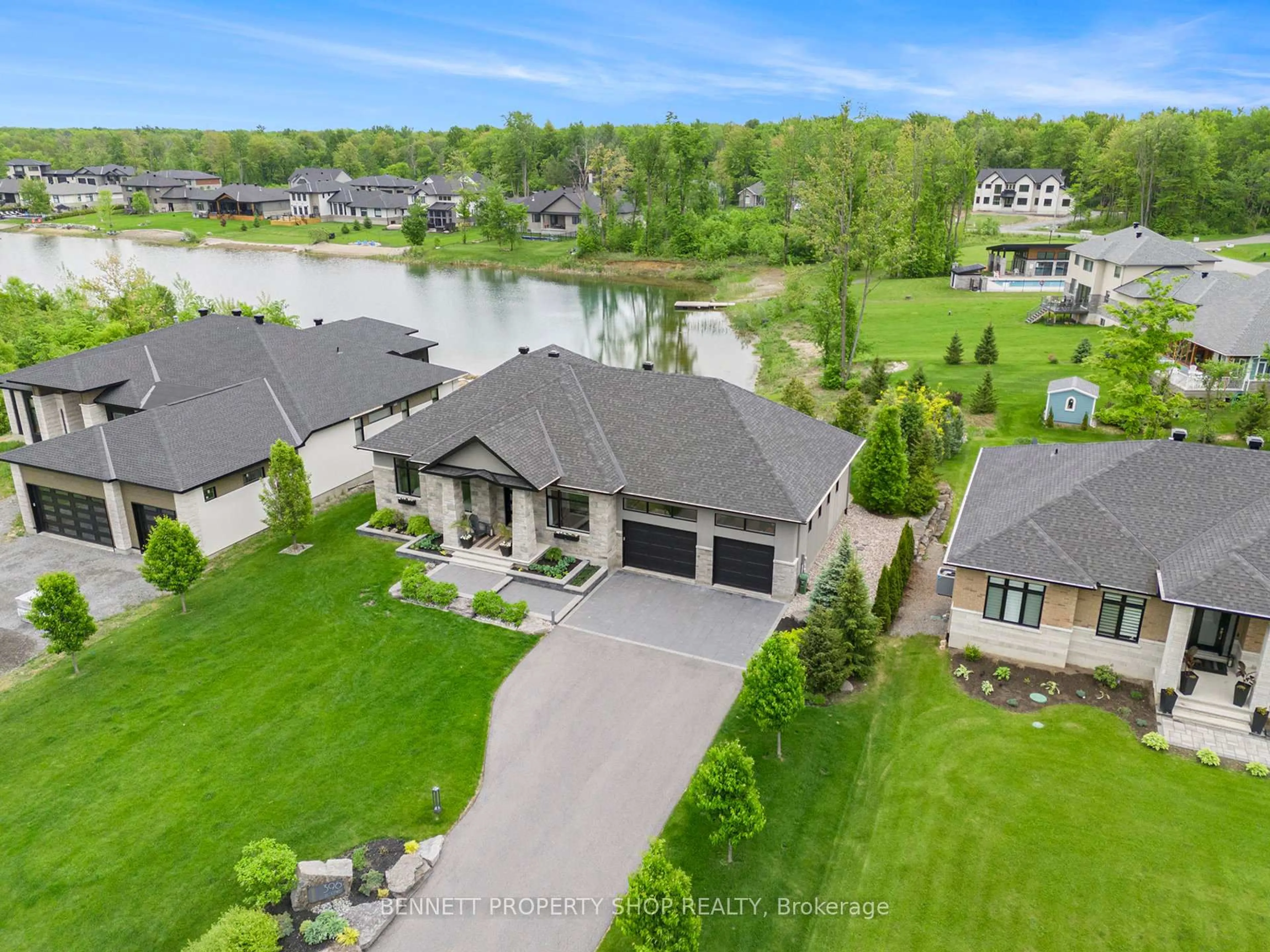 A pic from outside/outdoor area/front of a property/back of a property/a pic from drone, water/lake/river/ocean view for 396 Shoreway Dr, Greely Ontario K4P 0G2