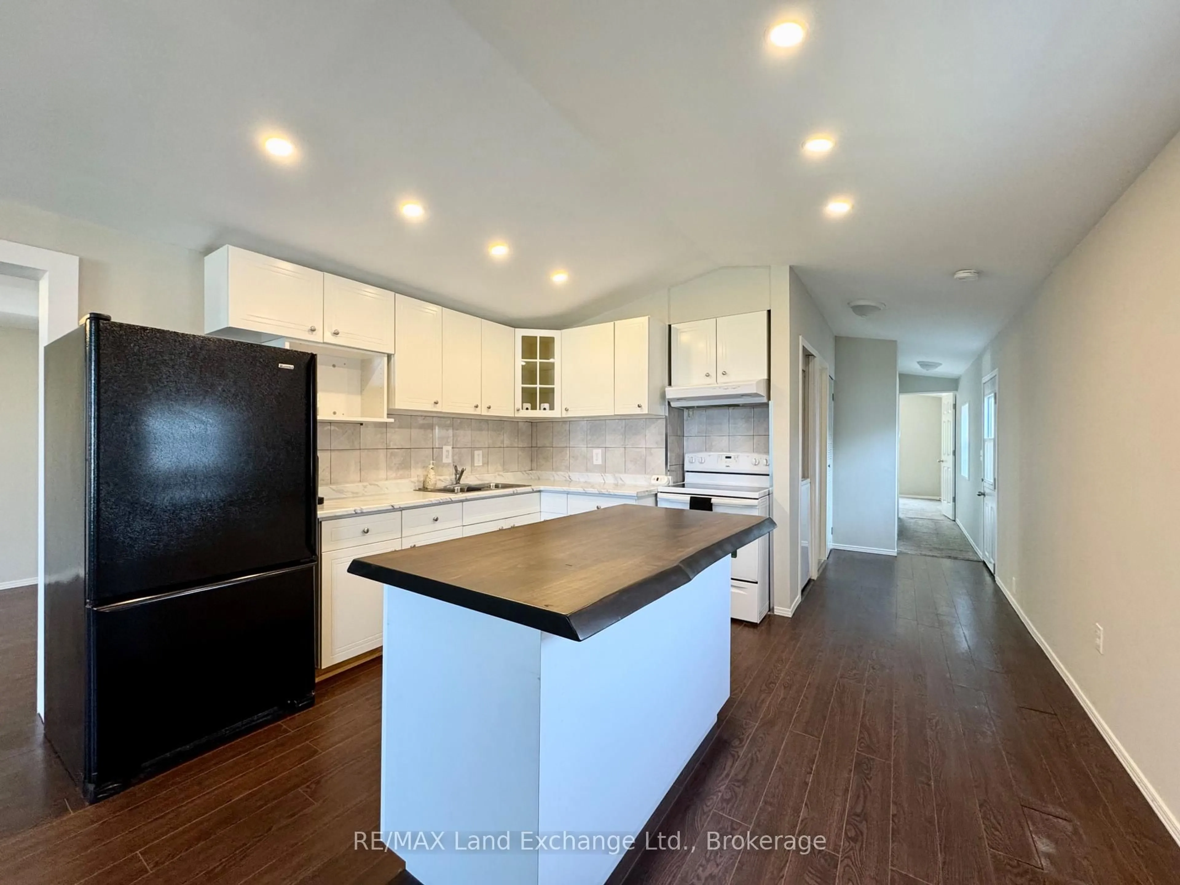 Open concept kitchen, wood/laminate floor for 332-19 Concession 6 Rd, Saugeen Shores Ontario N0H 2C7