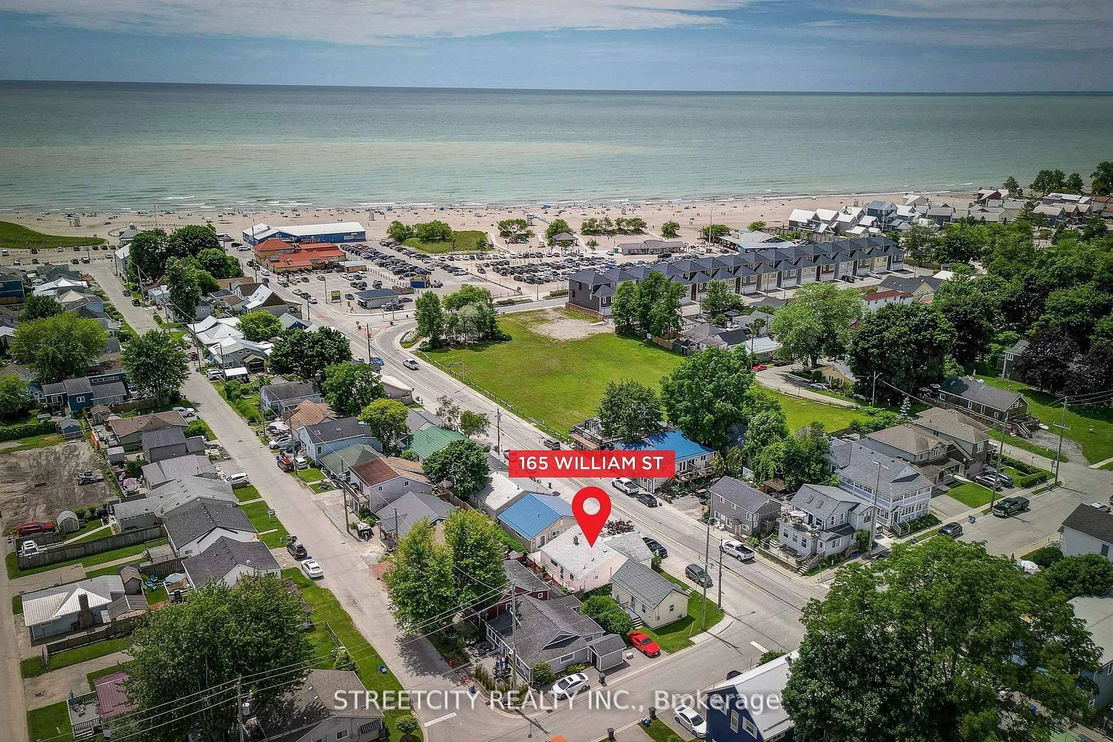 A pic from outside/outdoor area/front of a property/back of a property/a pic from drone, water/lake/river/ocean view for 165 William St, Central Elgin Ontario N5L 1C7