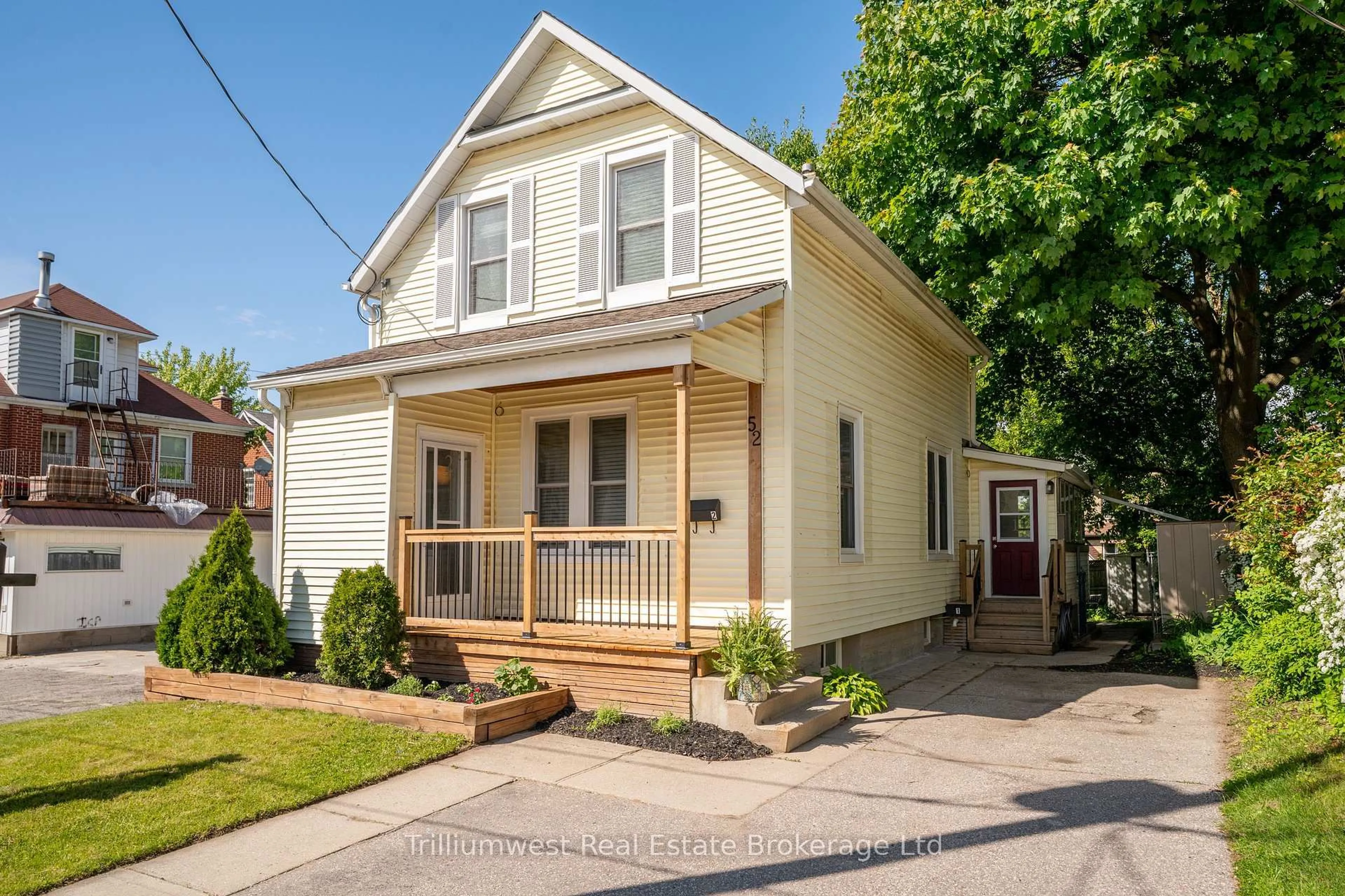 Home with vinyl exterior material, street for 52 Henry St, Kitchener Ontario N2G 1P3