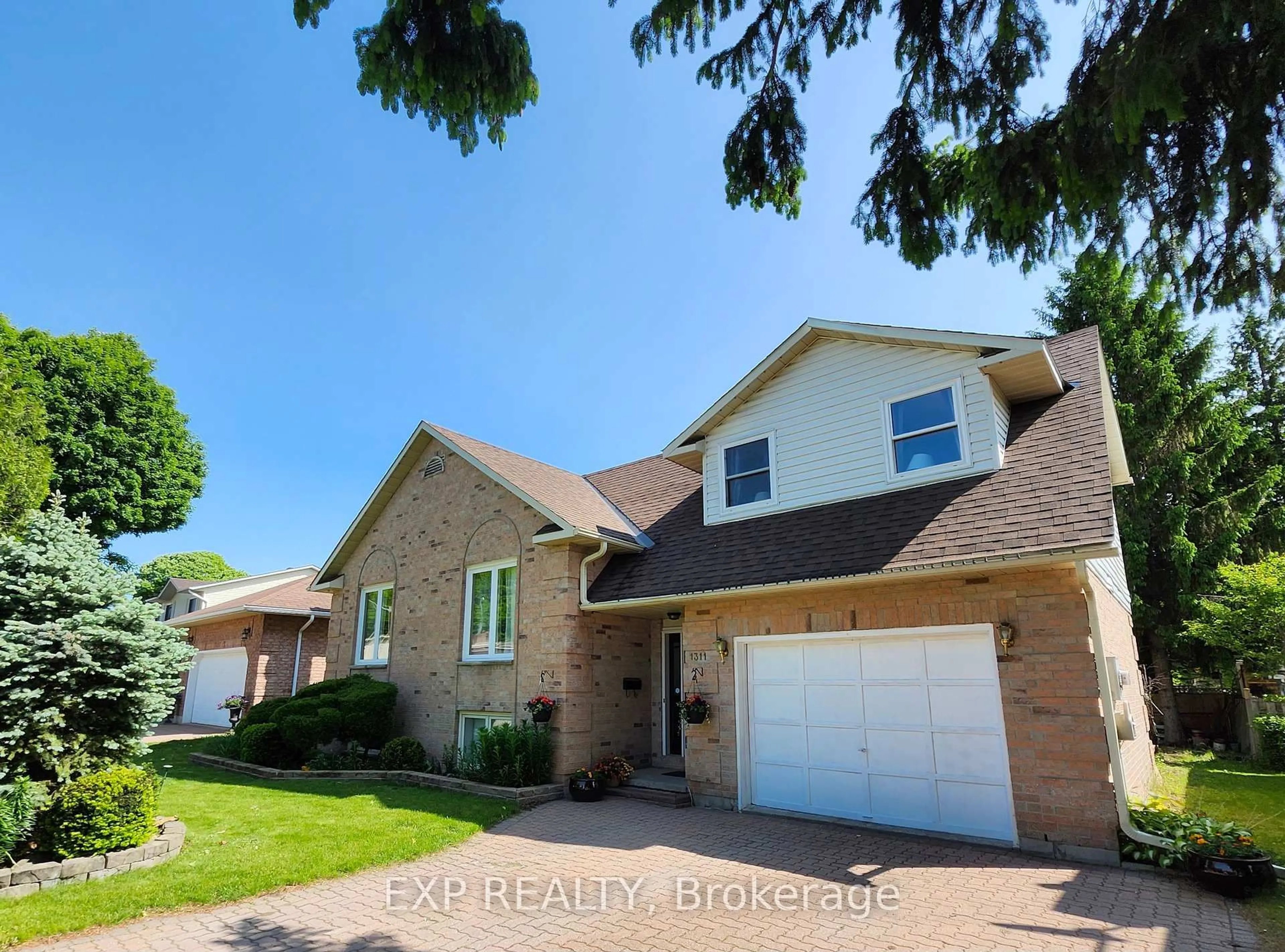 Home with brick exterior material, street for 1311 Cuthbertson Ave, Brockville Ontario K6V 6Y2