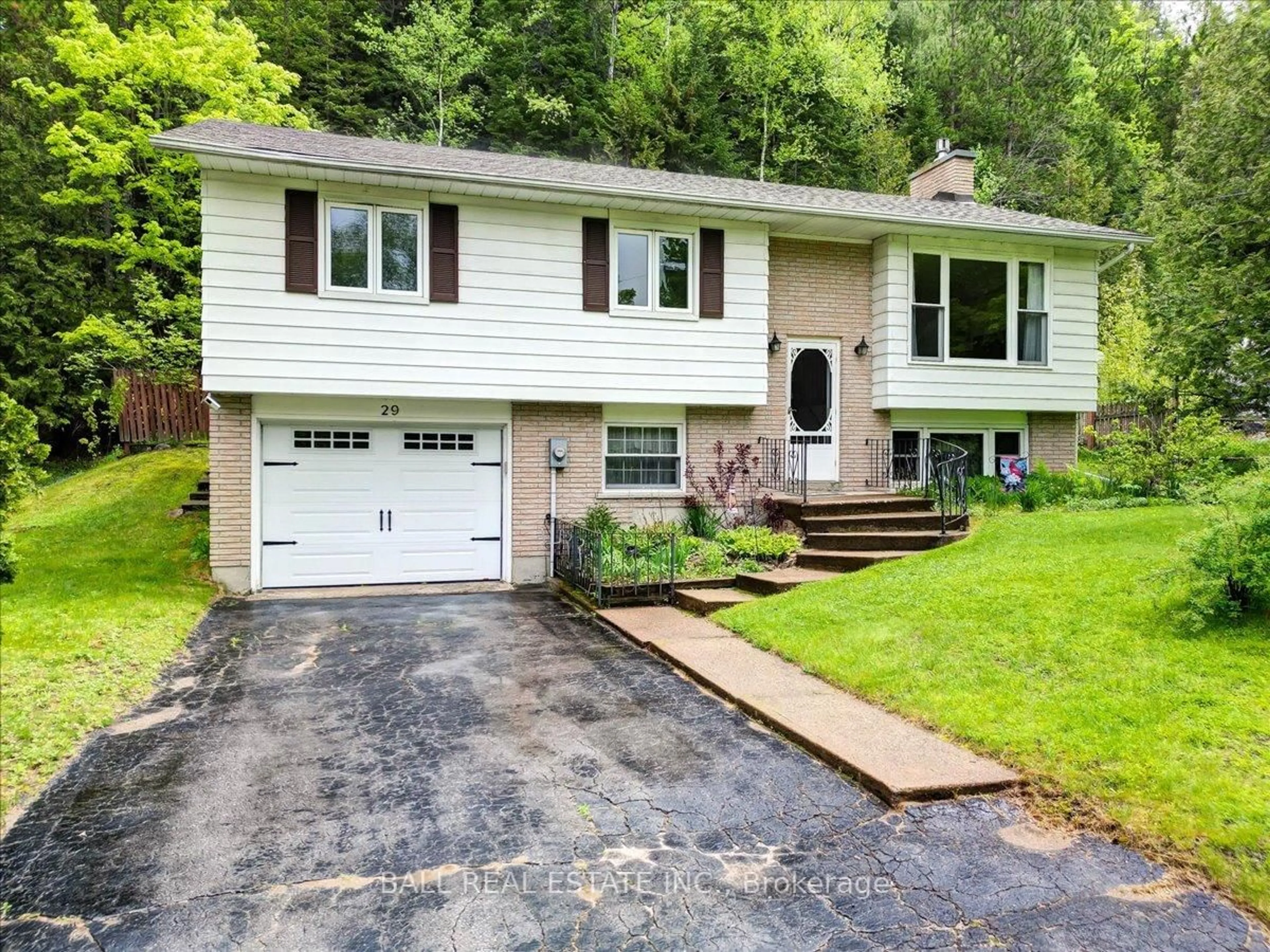 Home with vinyl exterior material, street for 29 Forest Hill Rd, Bancroft Ontario K0L 1C0