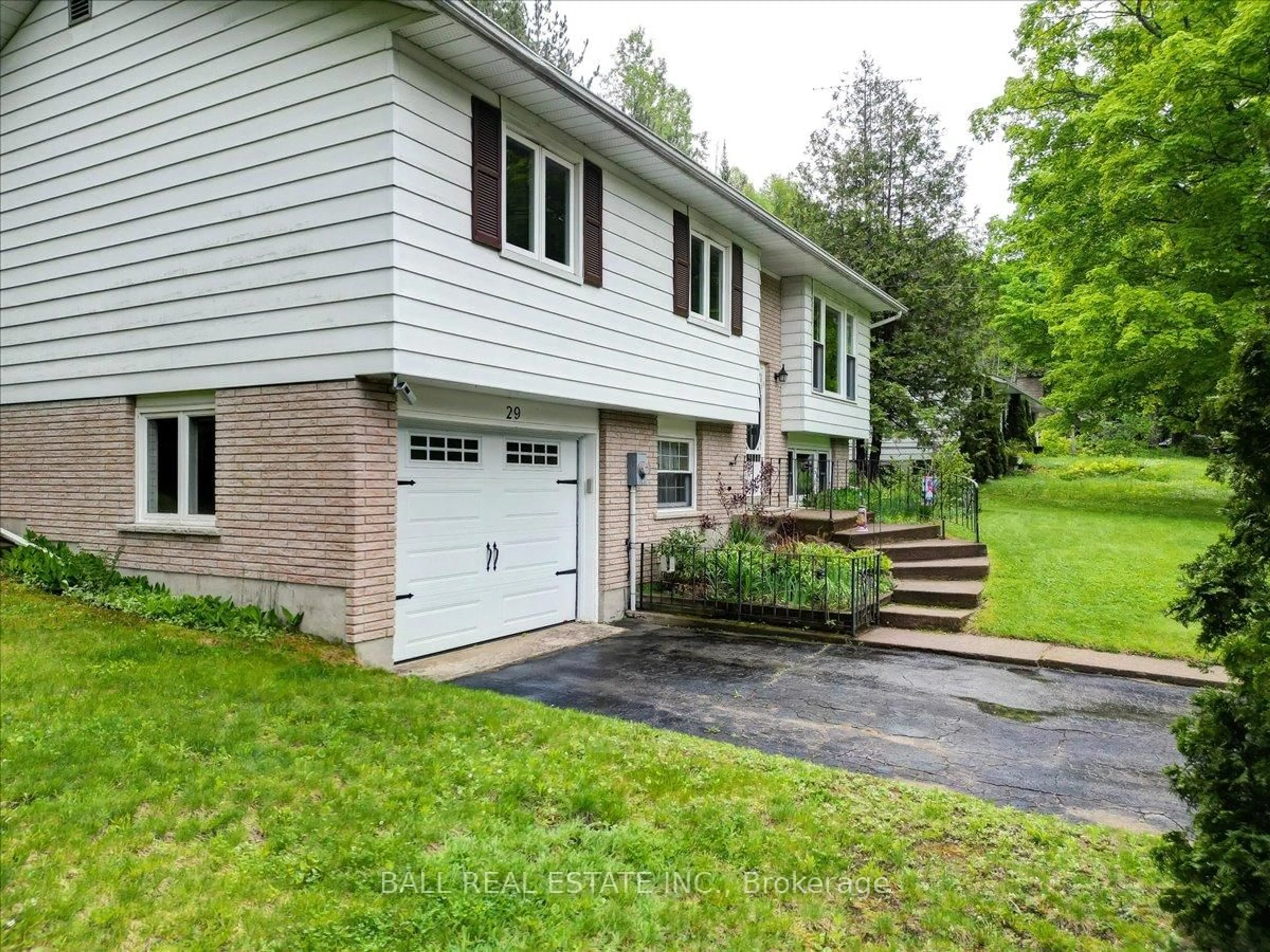 Home with vinyl exterior material, street for 29 Forest Hill Rd, Bancroft Ontario K0L 1C0