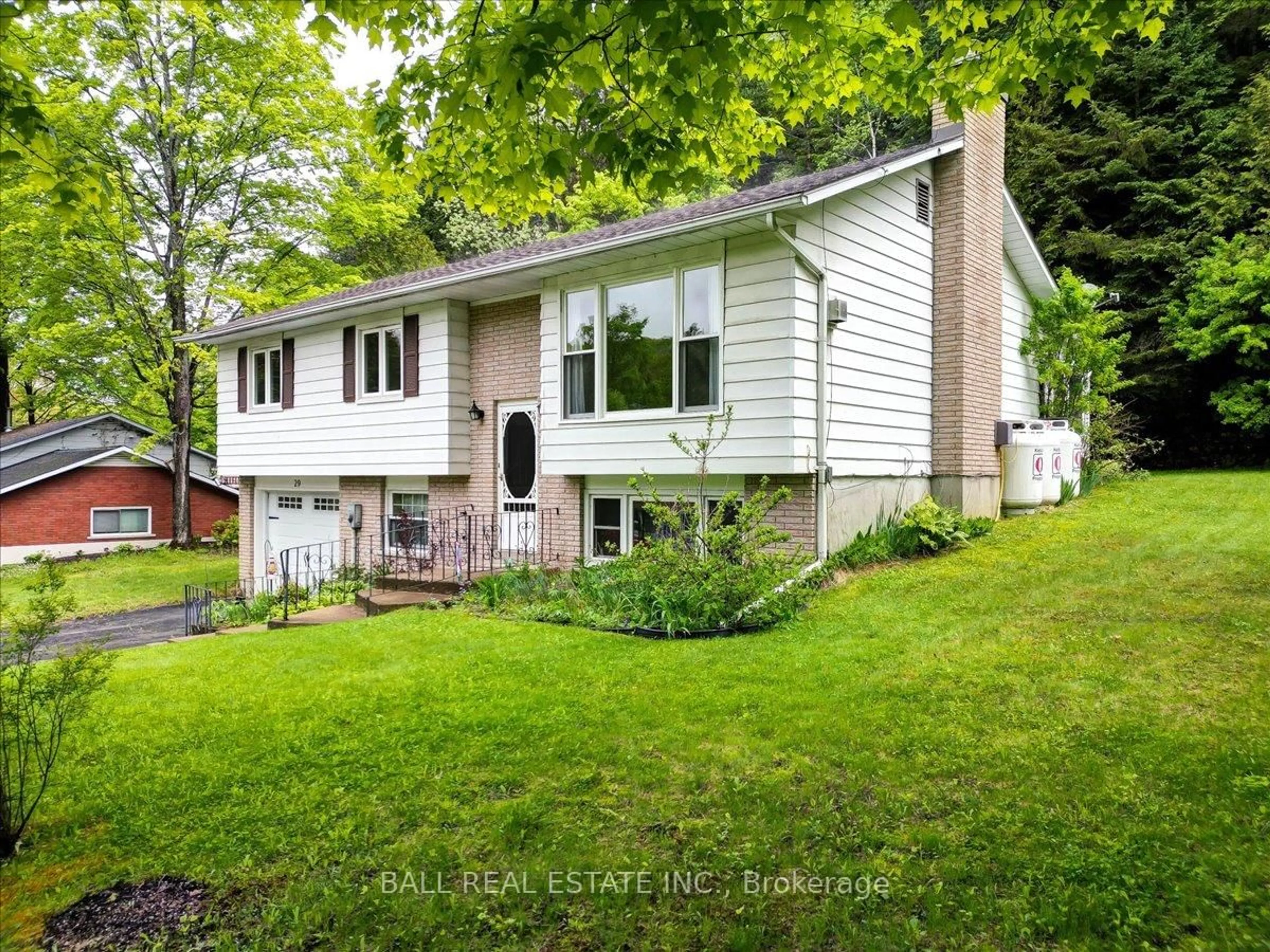 Home with vinyl exterior material, street for 29 Forest Hill Rd, Bancroft Ontario K0L 1C0