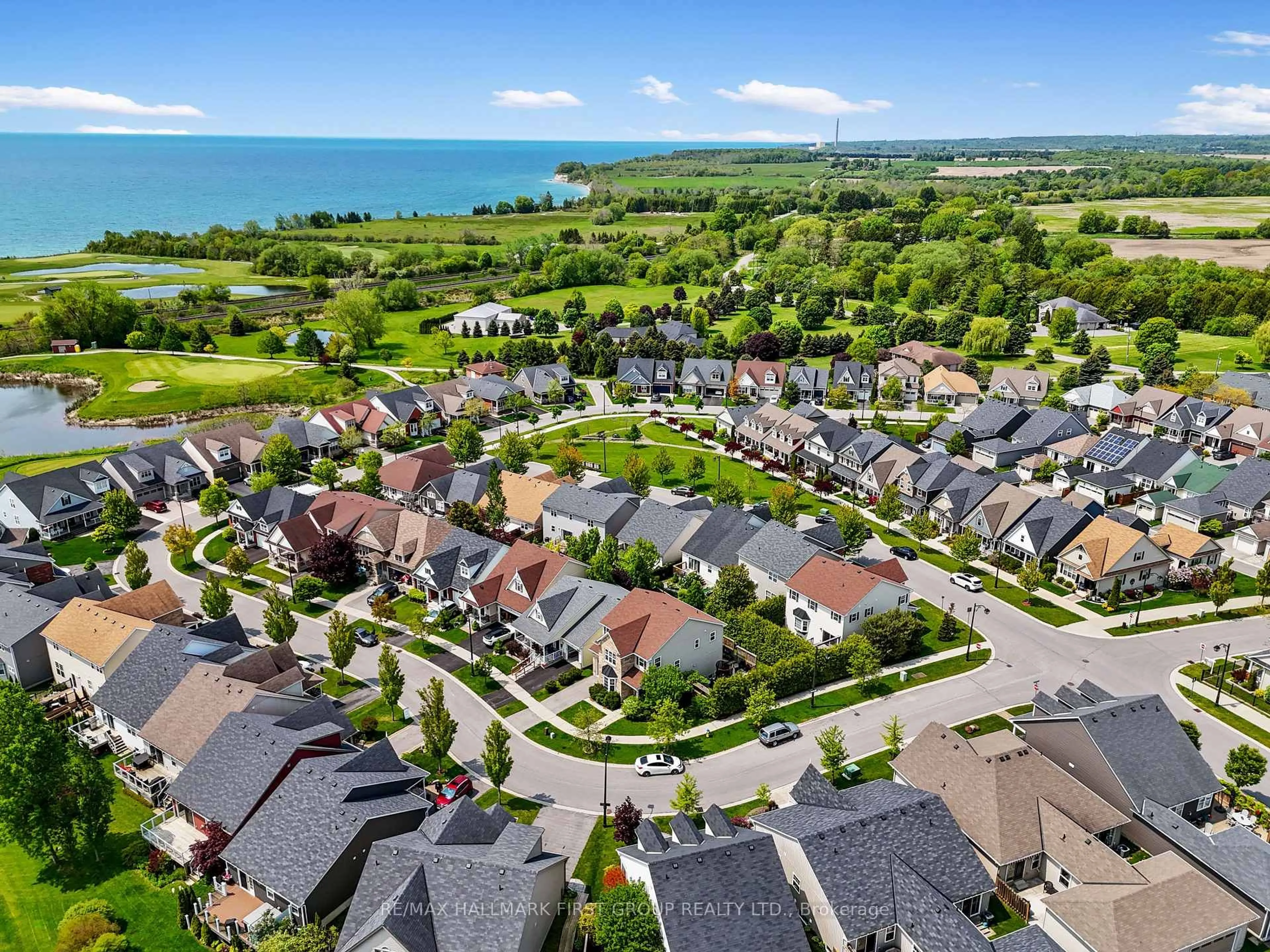 A pic from outside/outdoor area/front of a property/back of a property/a pic from drone, water/lake/river/ocean view for 14 Maple Blvd, Port Hope Ontario L1A 0C1