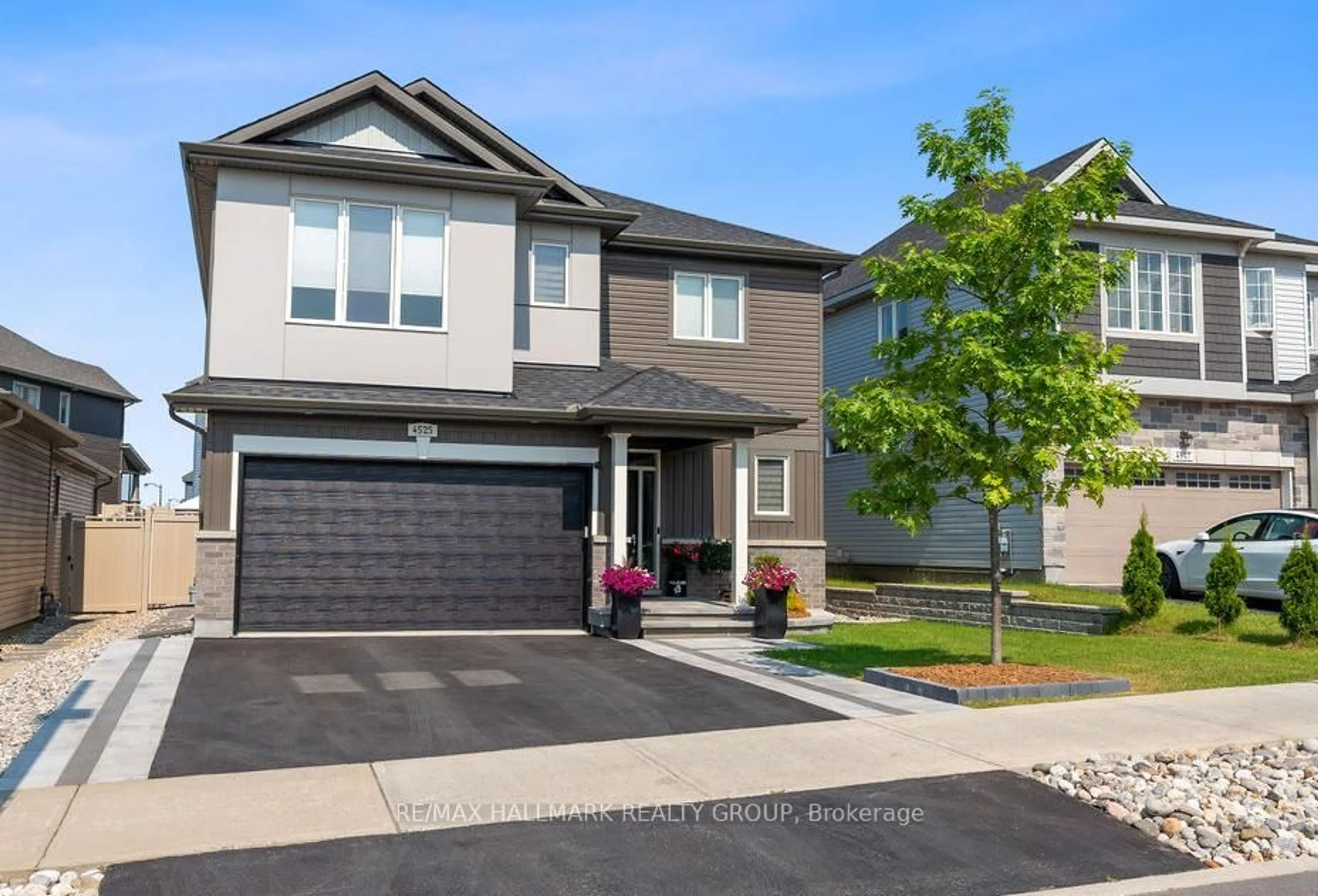 Home with vinyl exterior material, street for 4525 Kelly Farm Dr, Ottawa Ontario K1X 0E7