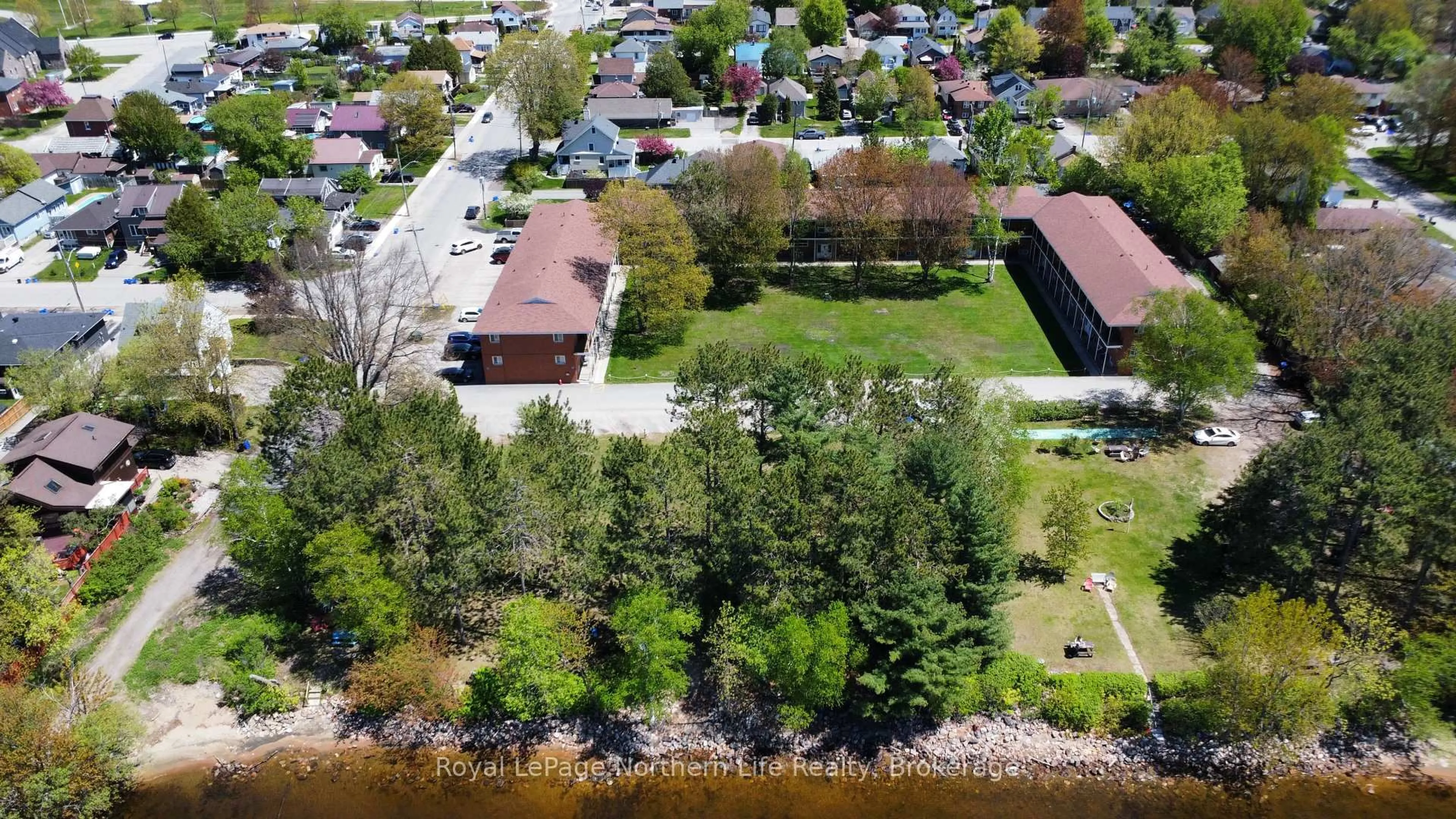 A pic from outside/outdoor area/front of a property/back of a property/a pic from drone, water/lake/river/ocean view for 40 Judge Ave #25, North Bay Ontario P1A 1B4
