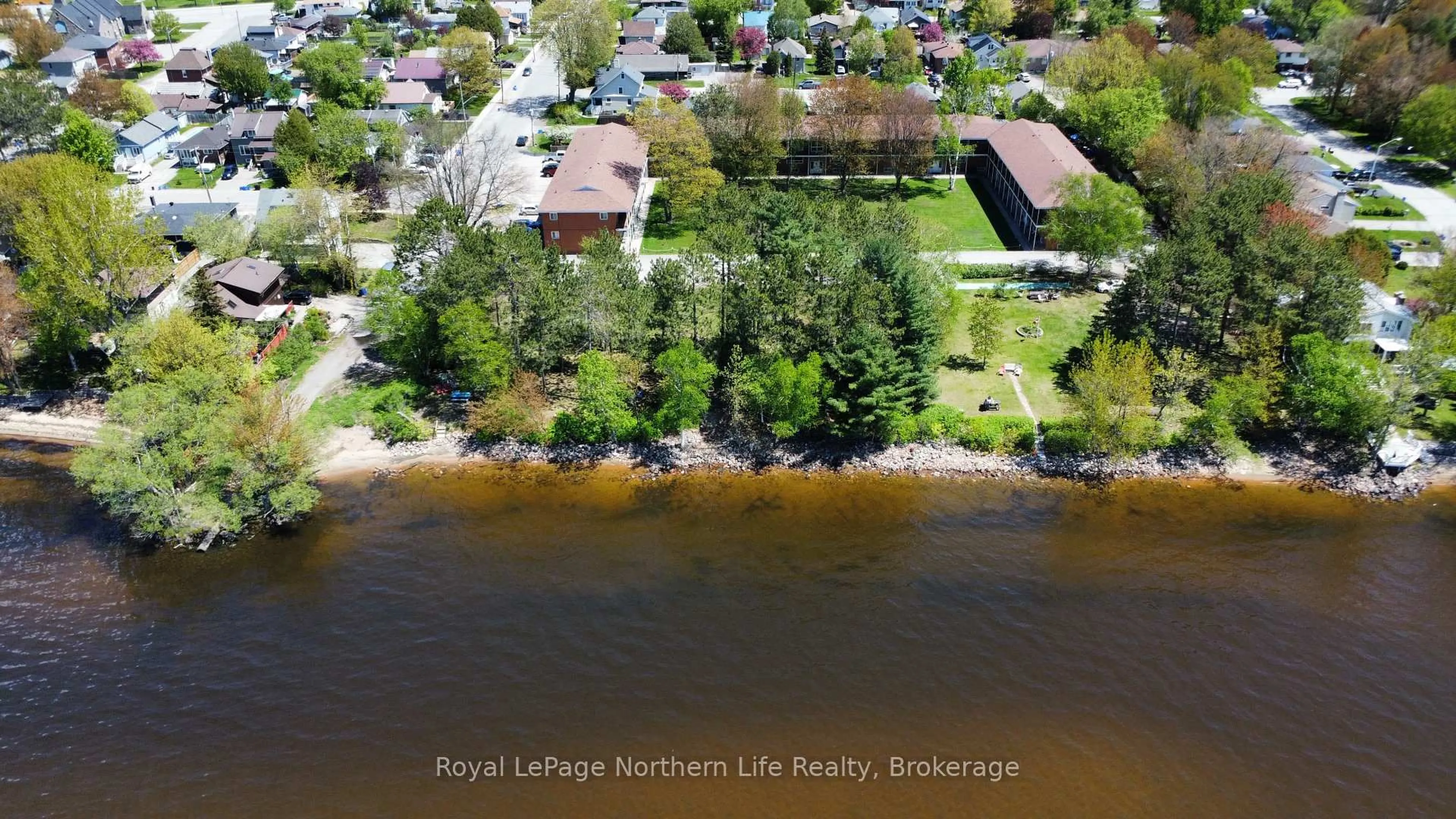 A pic from outside/outdoor area/front of a property/back of a property/a pic from drone, water/lake/river/ocean view for 40 Judge Ave #25, North Bay Ontario P1A 1B4