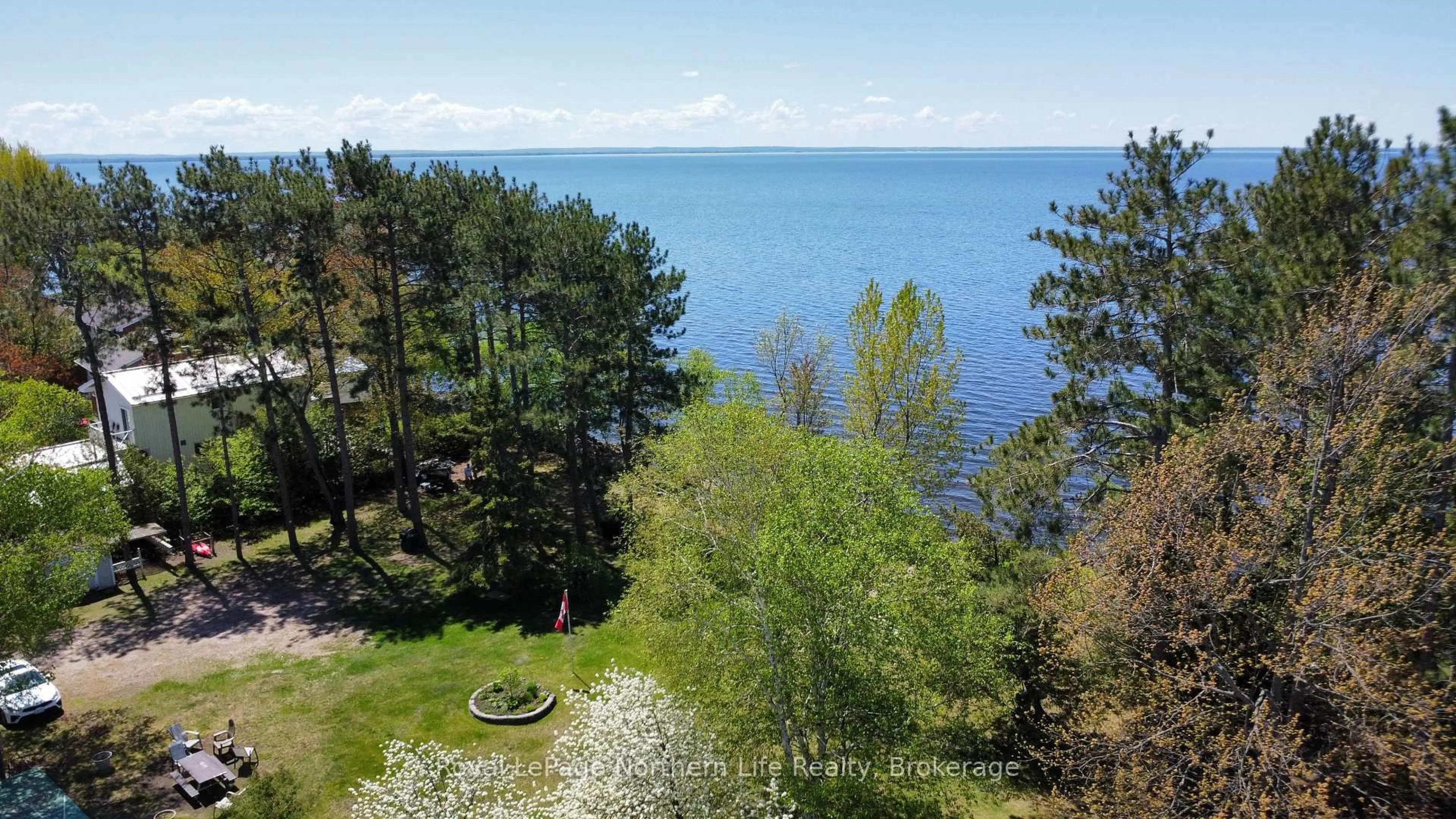 A pic from outside/outdoor area/front of a property/back of a property/a pic from drone, water/lake/river/ocean view for 40 Judge Ave #25, North Bay Ontario P1A 1B4