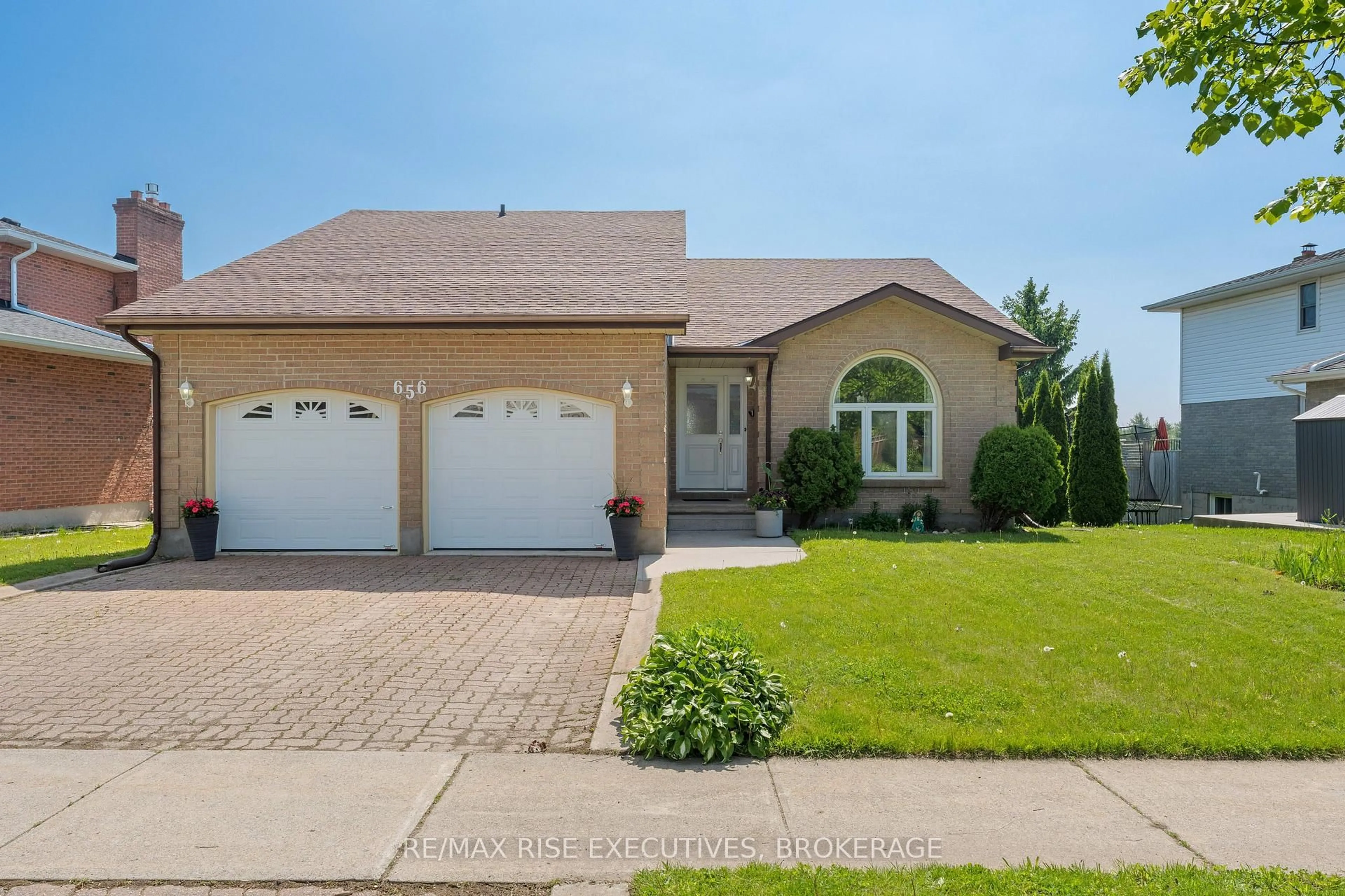Home with vinyl exterior material, street for 656 Rivermeade Ave, Kingston Ontario K7M 7Z6