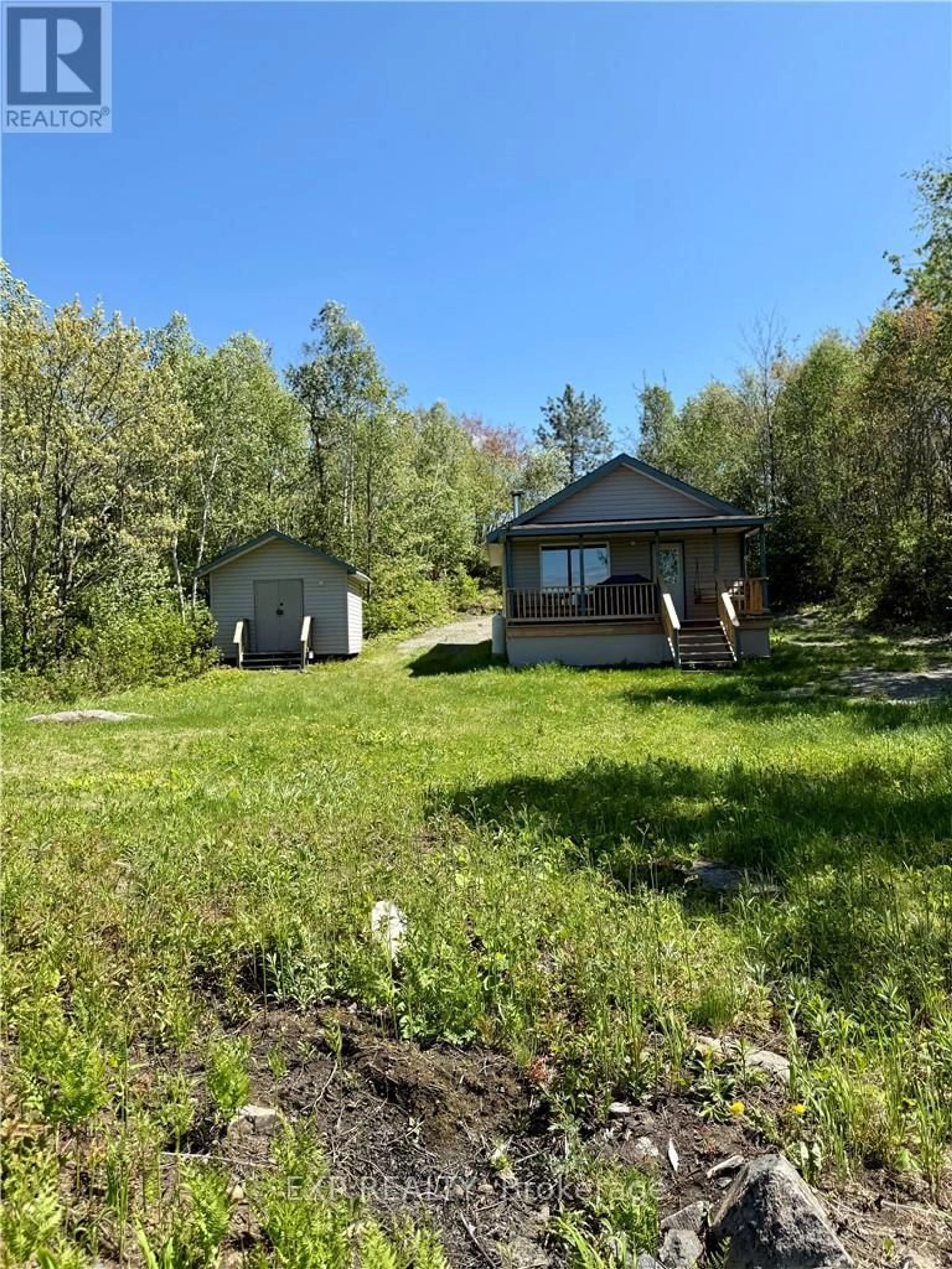 A pic from outside/outdoor area/front of a property/back of a property/a pic from drone, unknown for 1460 Fire Route M N/A, Greater Sudbury Ontario P0M 1L0