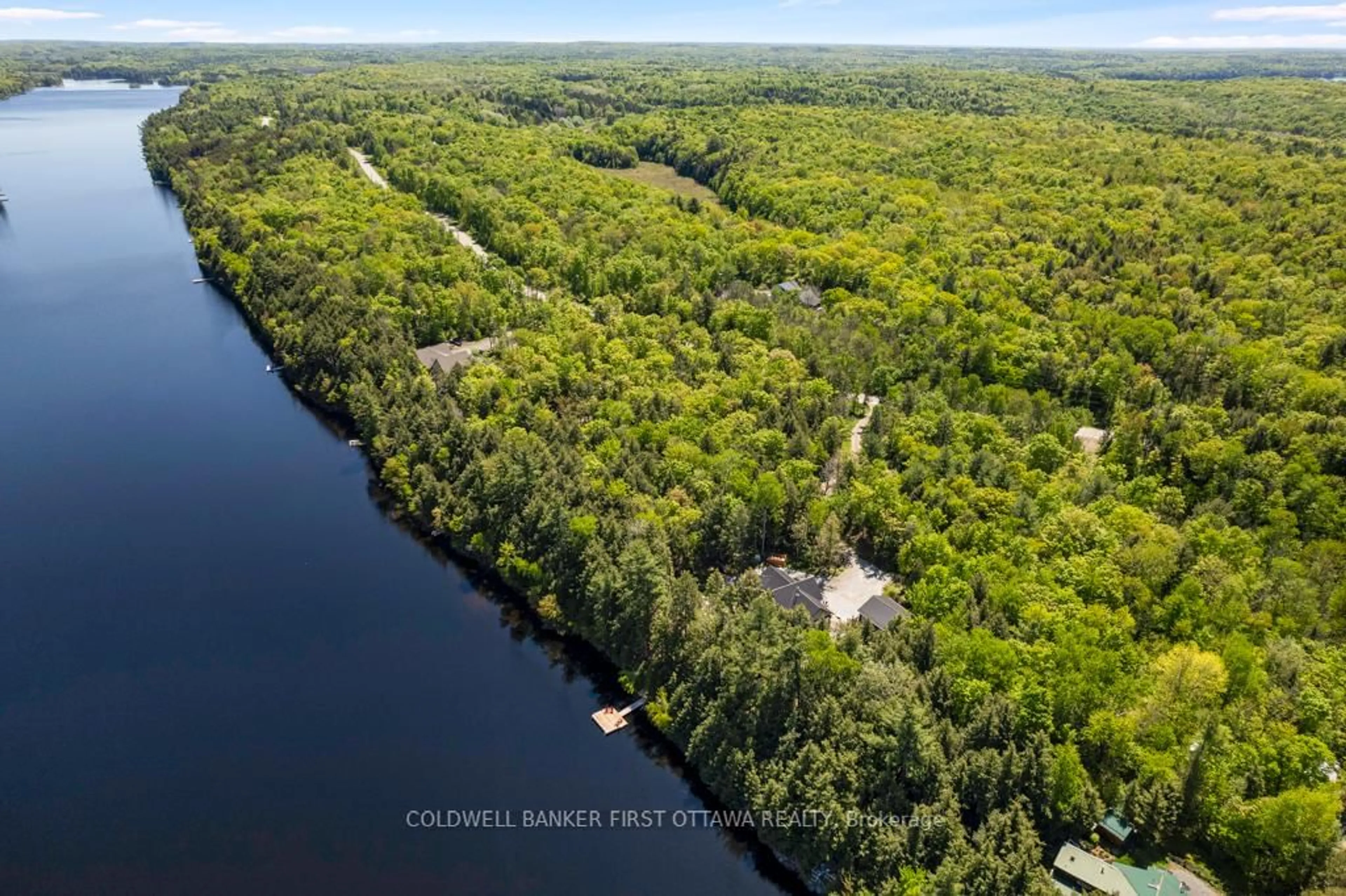 A pic from outside/outdoor area/front of a property/back of a property/a pic from drone, water/lake/river/ocean view for 1081 Nordic Rd, Central Frontenac Ontario K0H 0B6