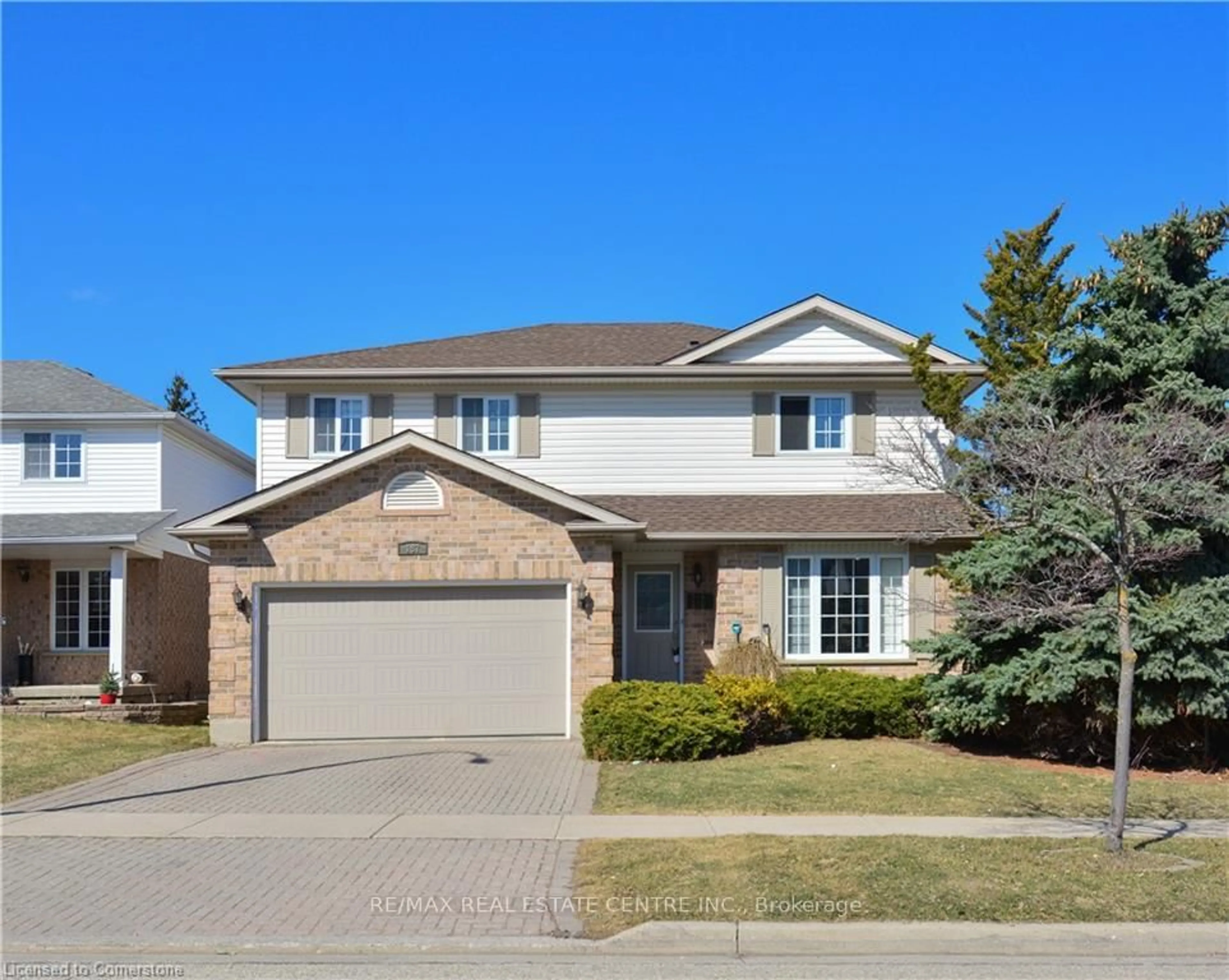 Home with brick exterior material, street for 187 DAIMLER Dr, Kitchener Ontario N2A 4C8