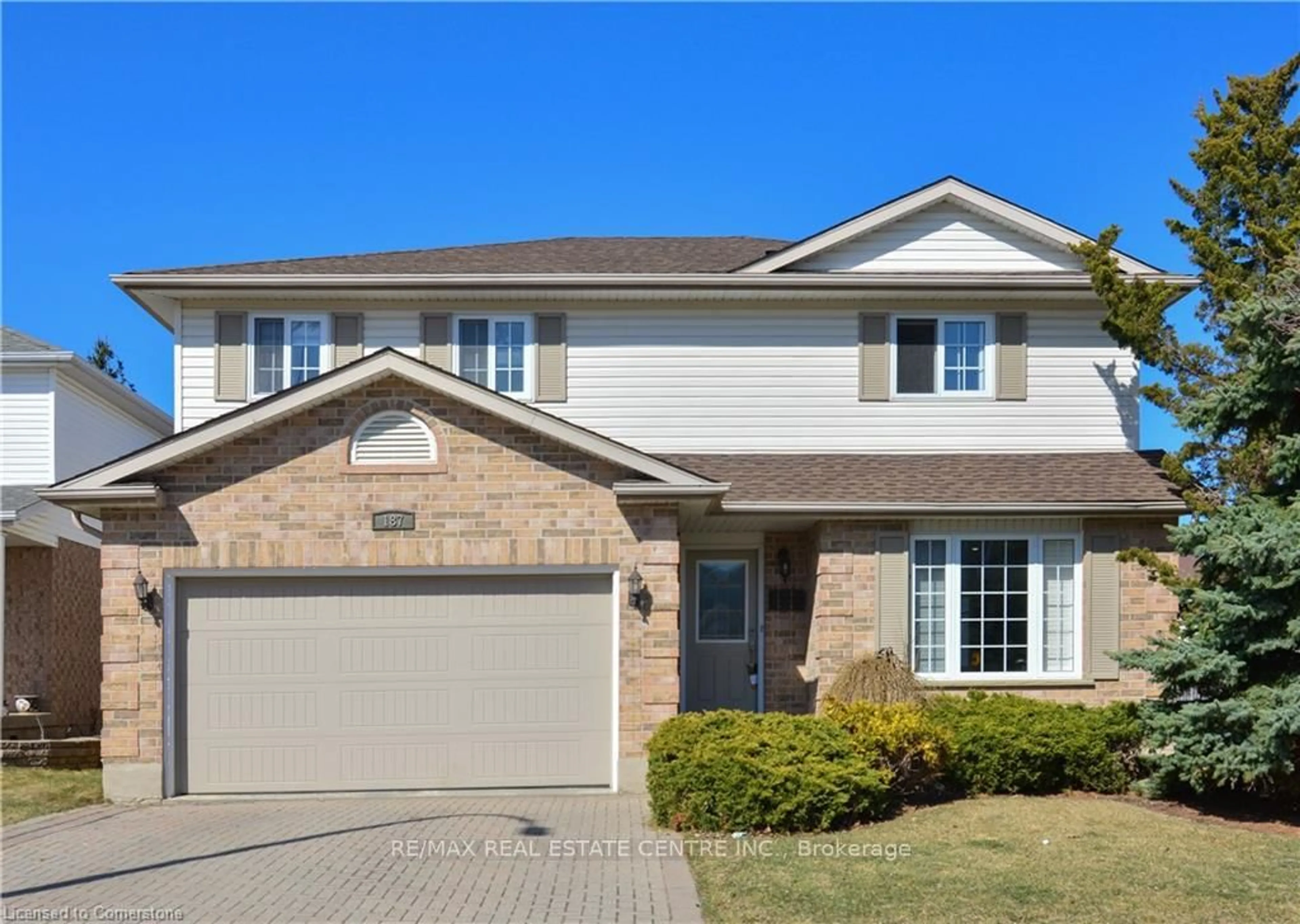 Home with brick exterior material, street for 187 DAIMLER Dr, Kitchener Ontario N2A 4C8