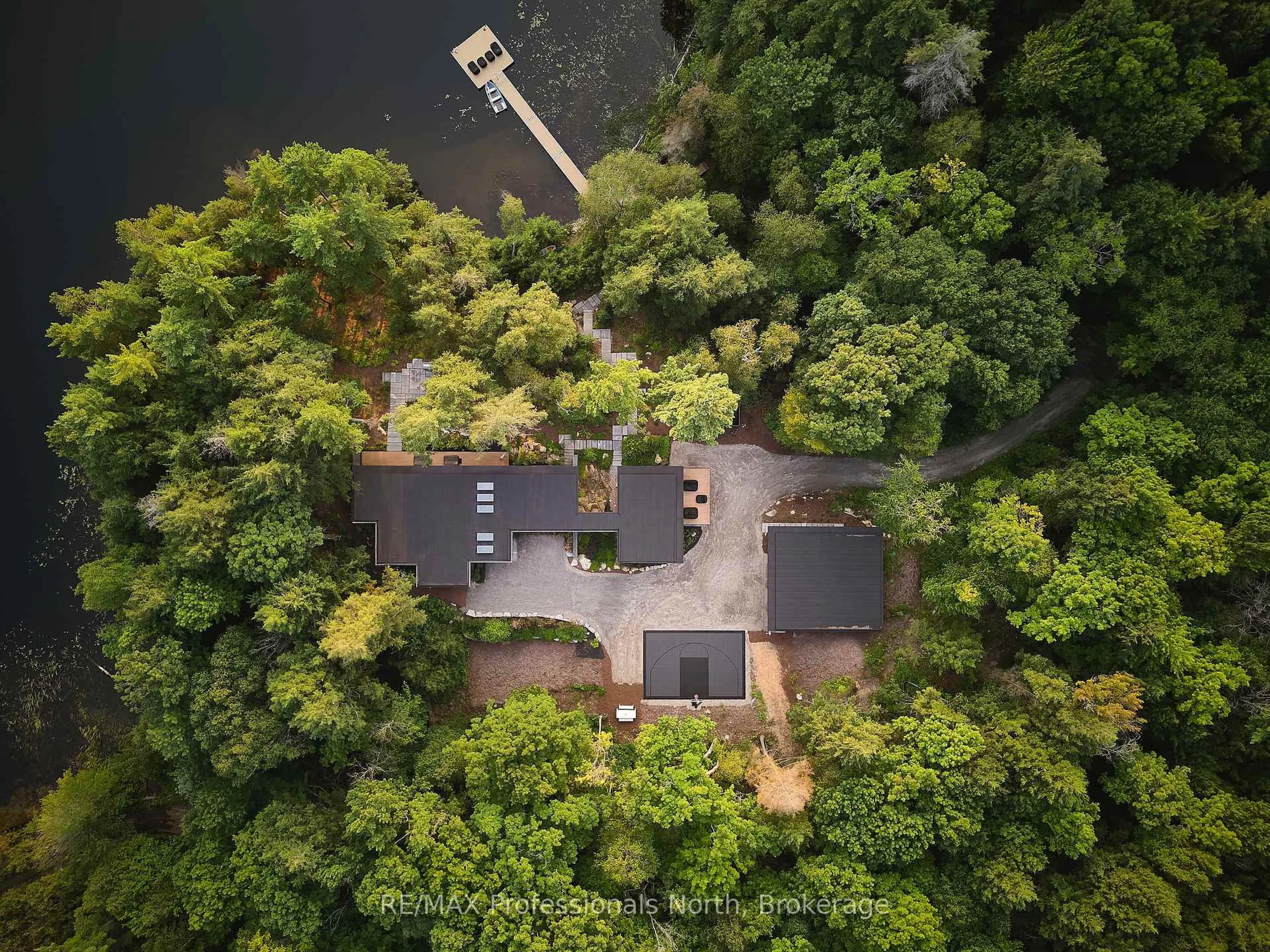 A pic from outside/outdoor area/front of a property/back of a property/a pic from drone, forest/trees view for 1298 Lipsy Lake Dr, Dysart et al Ontario K0M 1S0