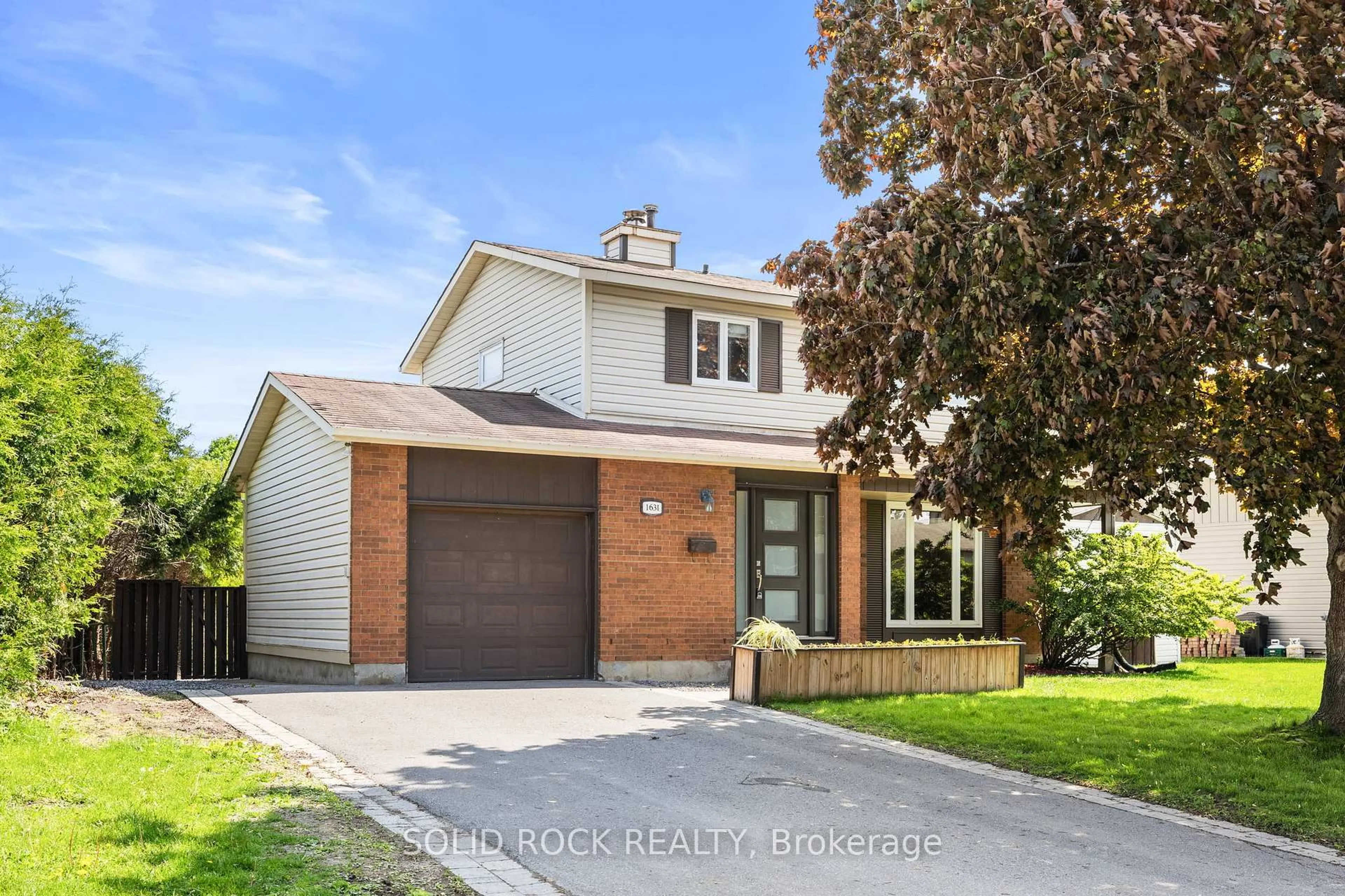 Home with brick exterior material, street for 1631 Charbonneau St, Orleans Ontario K1E 2J6
