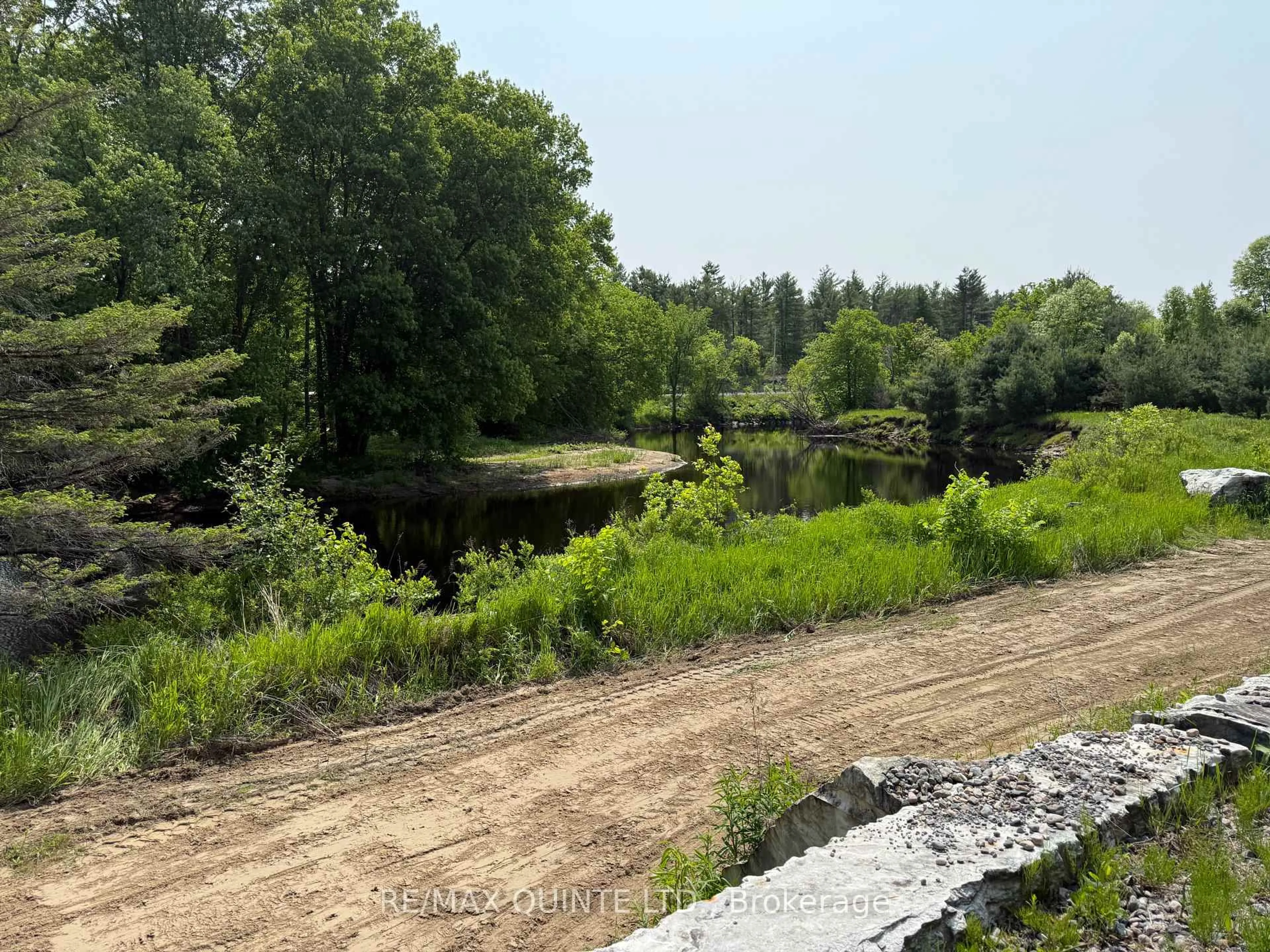 A pic from outside/outdoor area/front of a property/back of a property/a pic from drone, water/lake/river/ocean view for 39 Hawkins Bay Rd, Tweed Ontario K0K 3J0