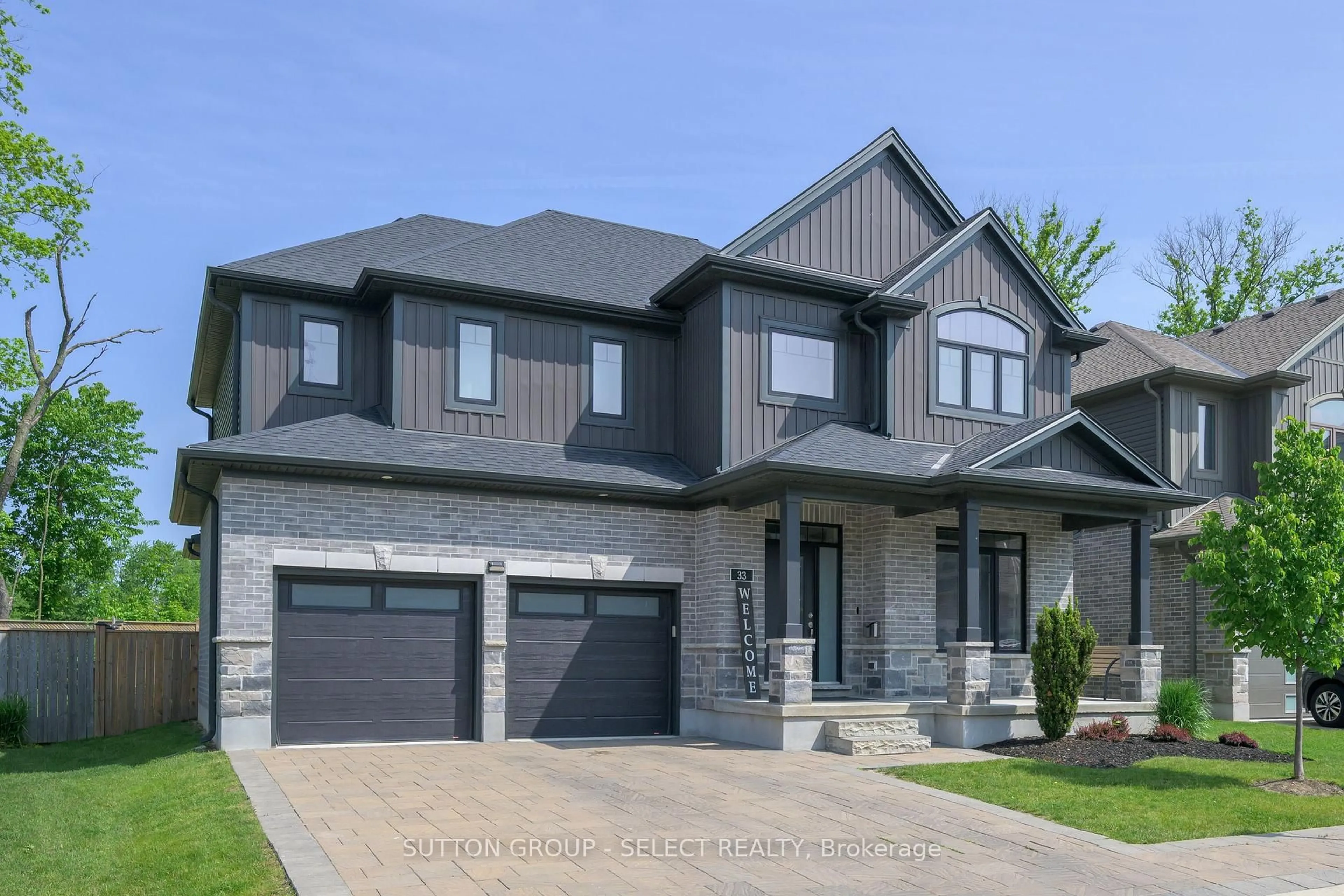Home with brick exterior material, street for 1061 Eagletrace Dr #33, London North Ontario N6G 0T3