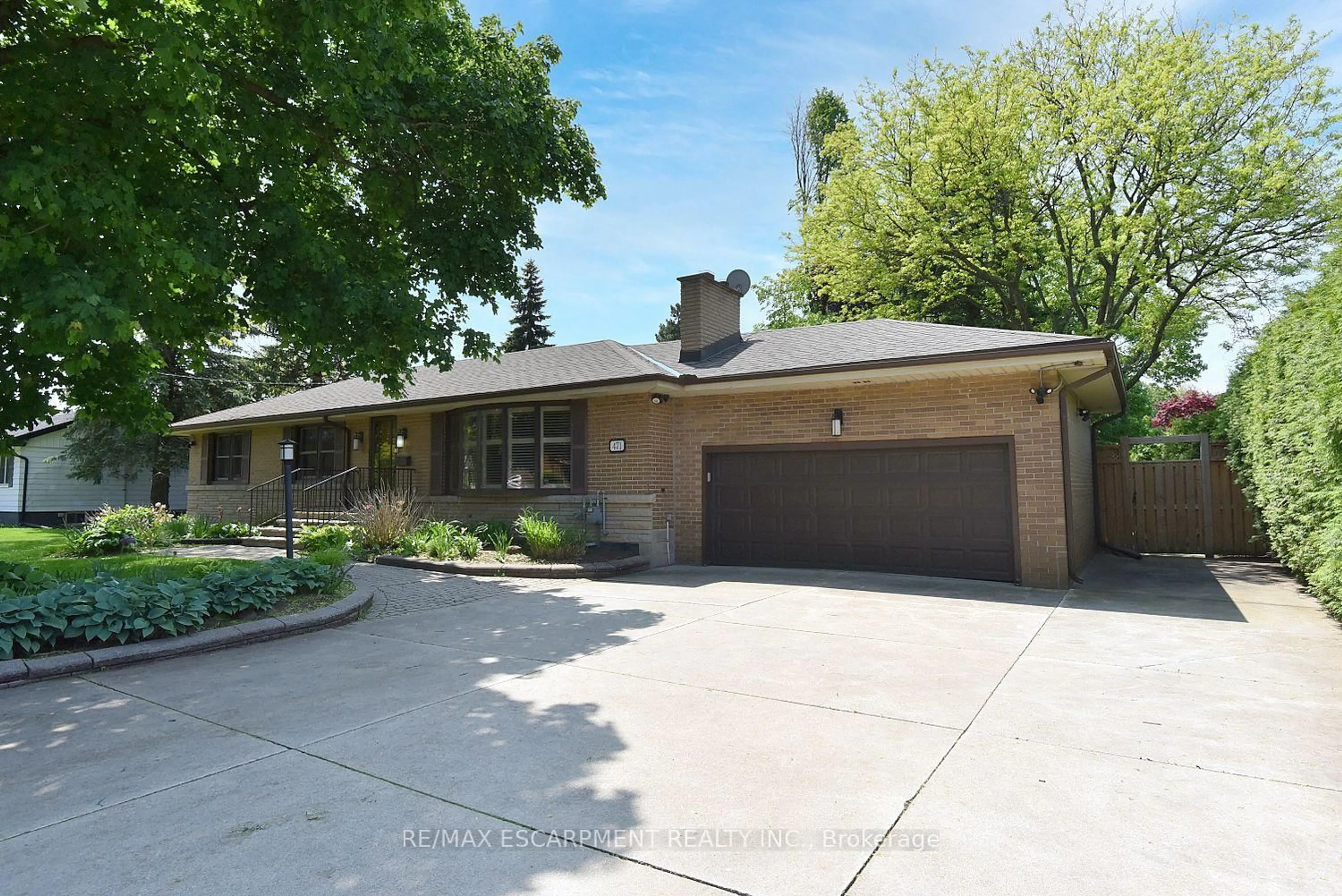 Home with brick exterior material, street for 471 Stone Church Rd, Hamilton Ontario L9B 1R7
