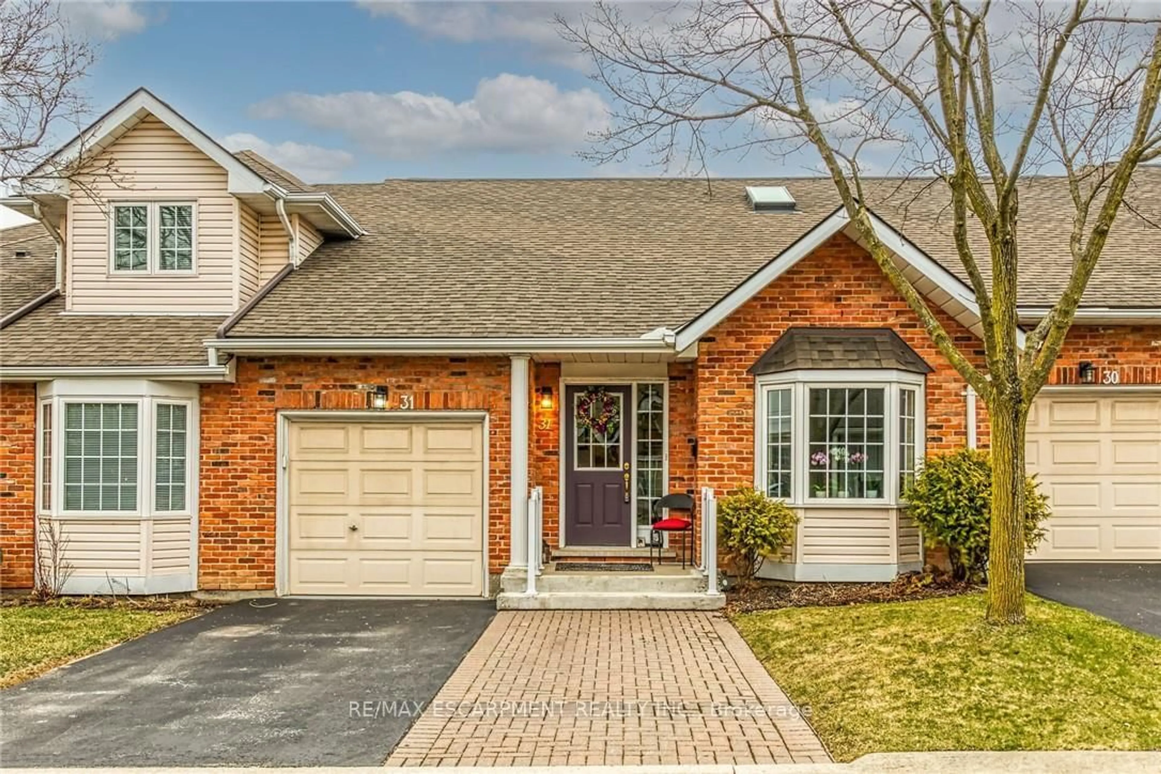 Home with brick exterior material, street for 810 Golf Links Rd #31, Hamilton Ontario L9K 1J7