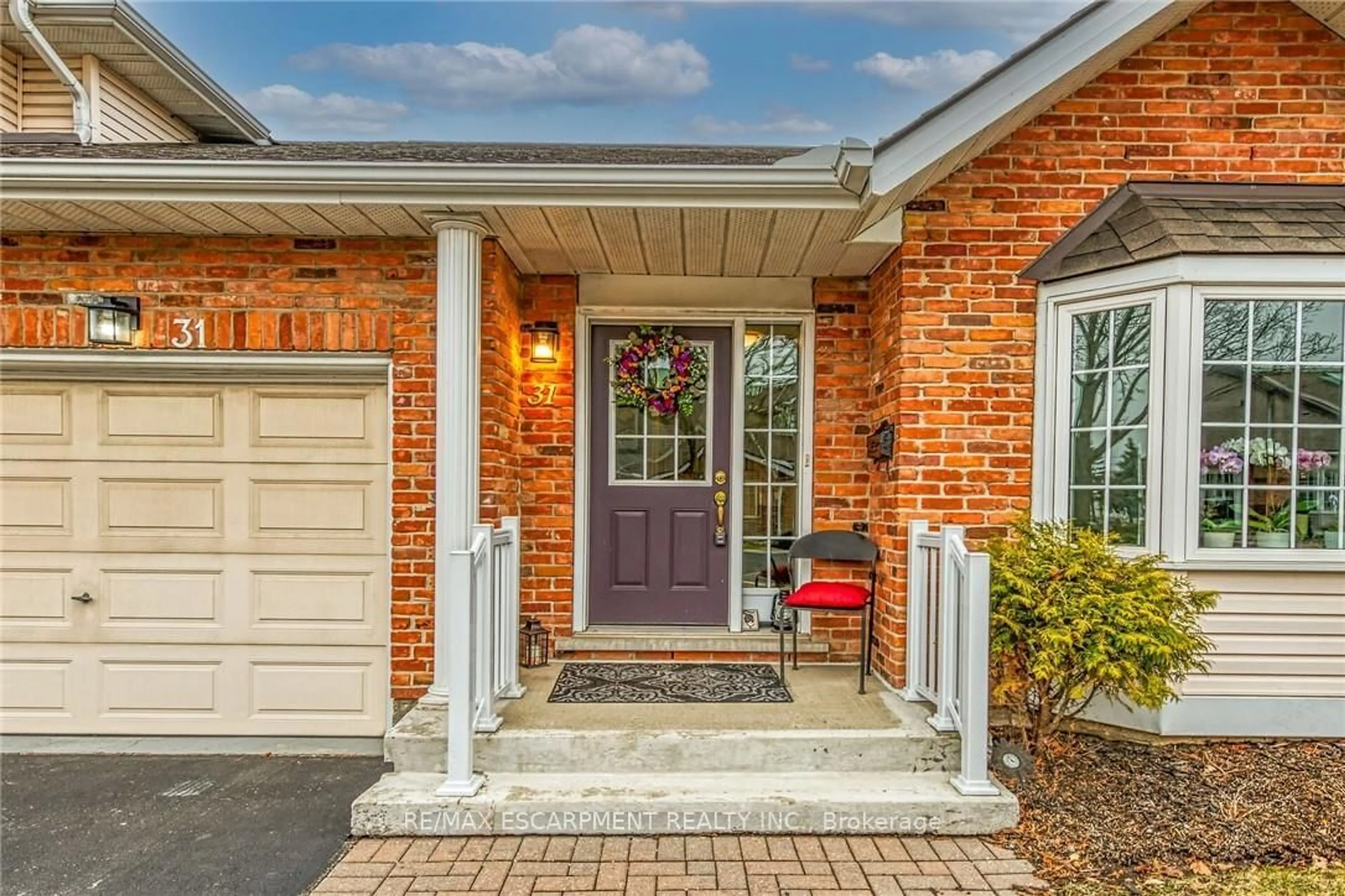 Home with brick exterior material, street for 810 Golf Links Rd #31, Hamilton Ontario L9K 1J7
