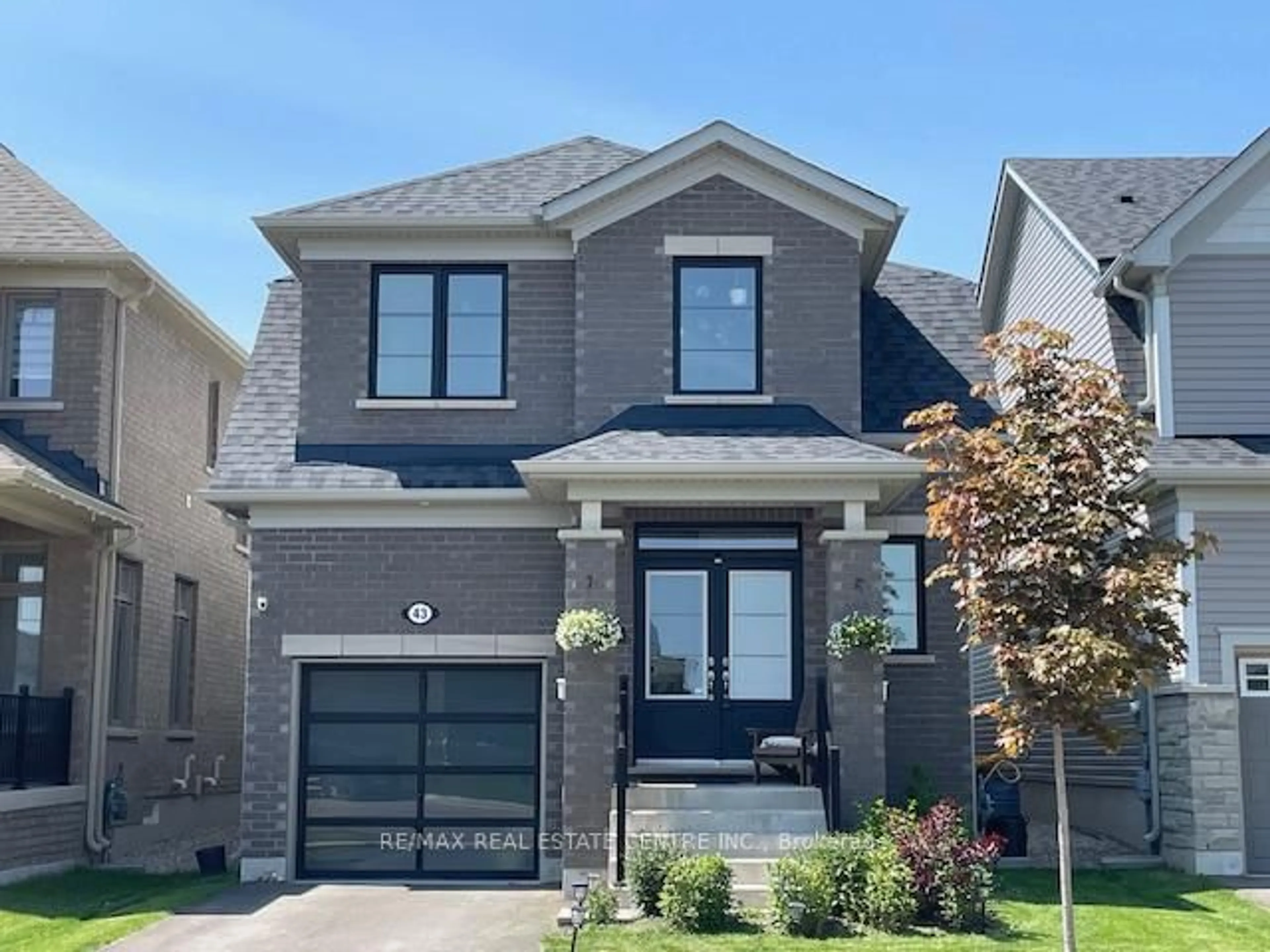 Home with brick exterior material, street for 43 Elliot Ave, Centre Wellington Ontario N1M 0J3