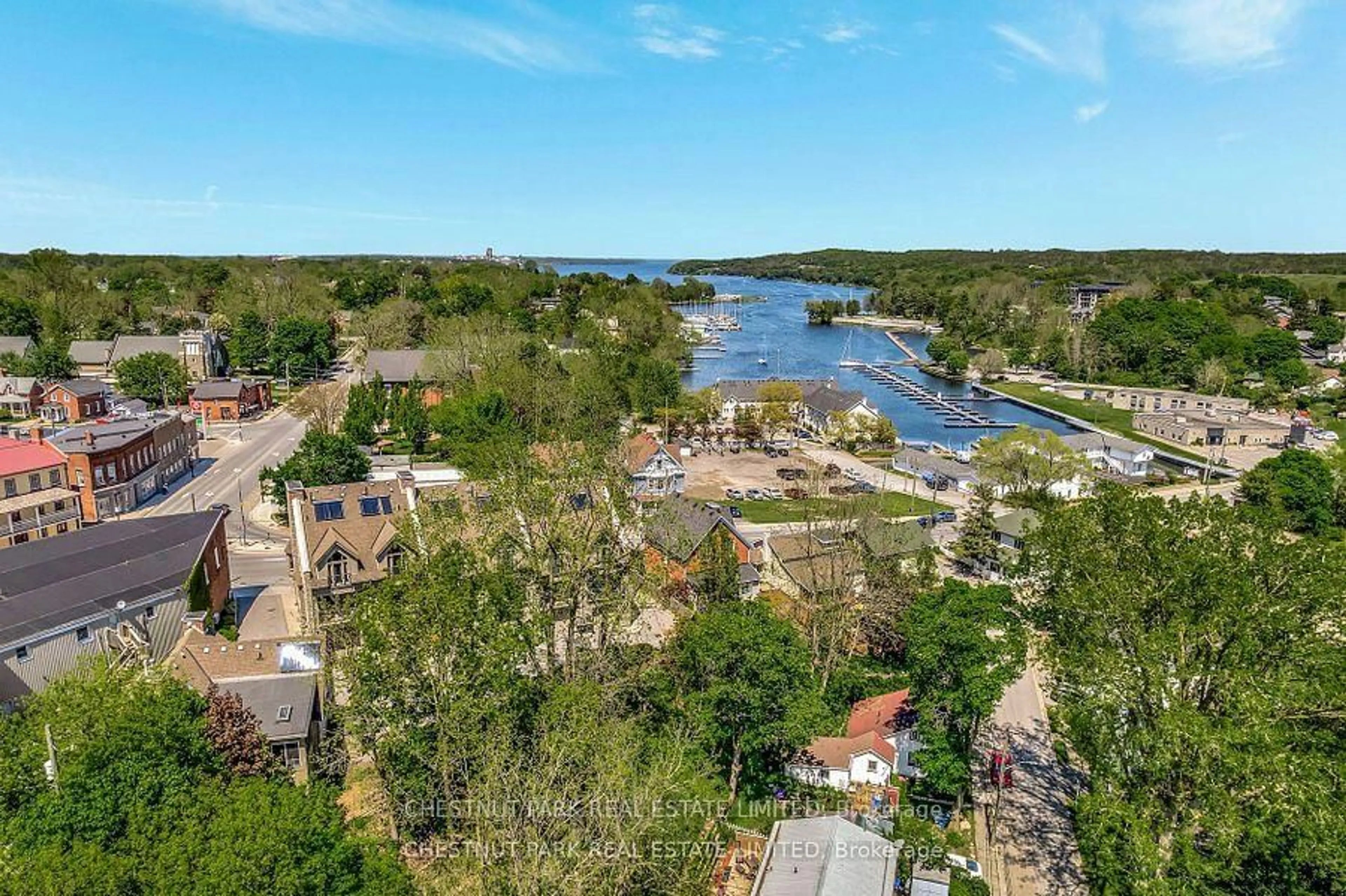 A pic from outside/outdoor area/front of a property/back of a property/a pic from drone, water/lake/river/ocean view for 4 Bridge St #7, Prince Edward County Ontario K0K 2T0